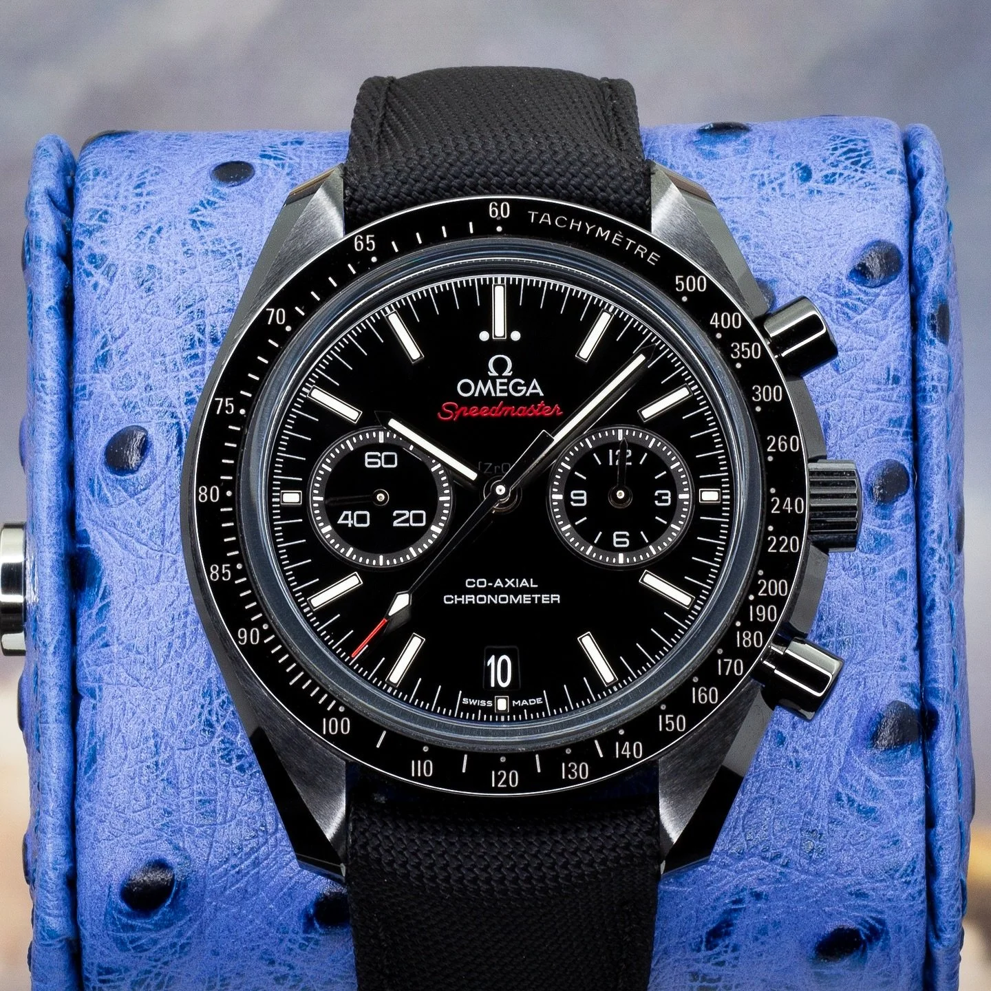 🌑 Omega Speedmaster “Dark Side of the Moon”
Reference: 311.92.44.51.01.007
Crafted from black zirconium oxide ceramic and powered by Omega’s Co-Axial Calibre 9300, this modern Speedmaster captures the spirit of space exploration
