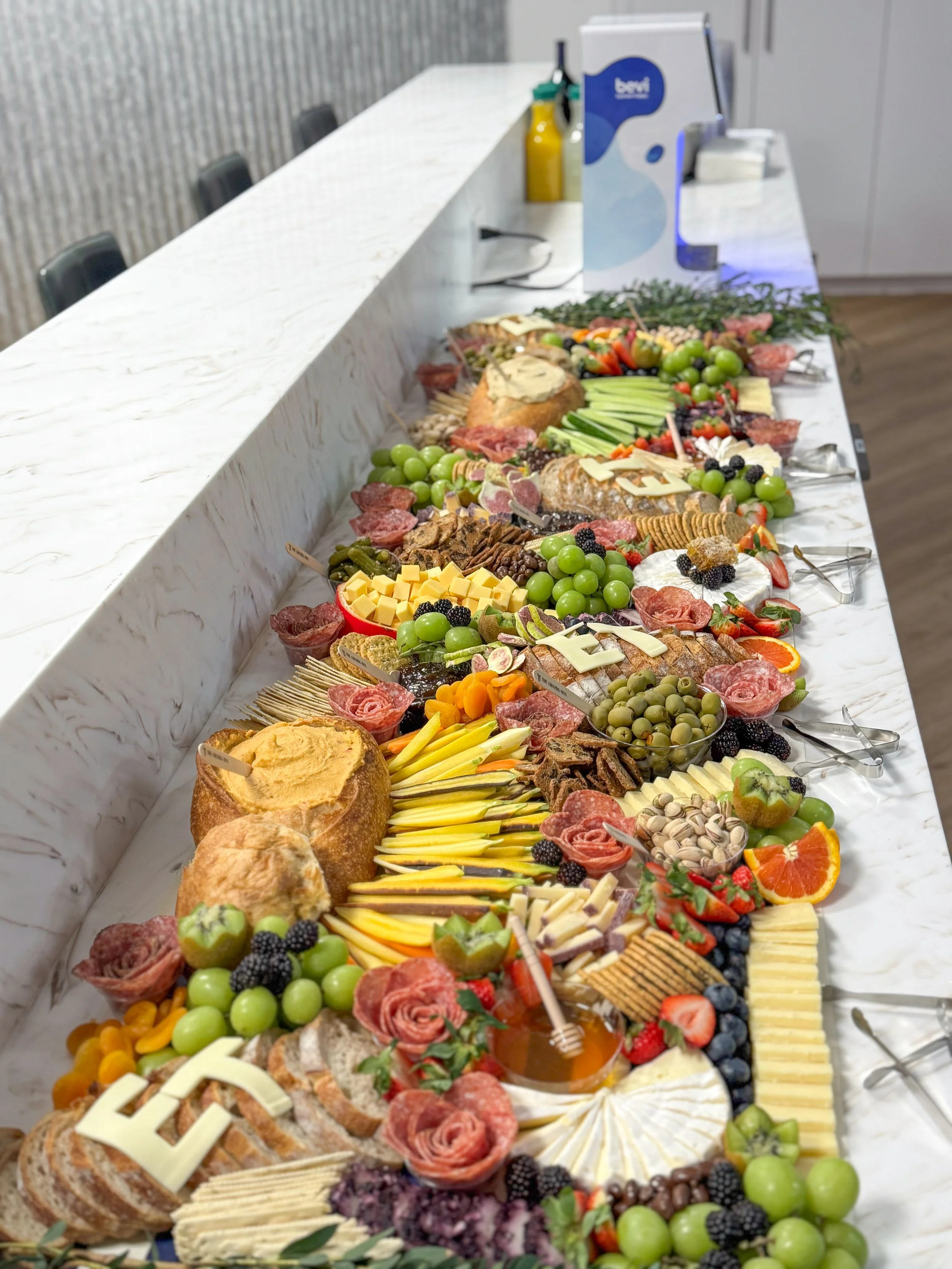 Corporate Grazing Table with custom cheese letters