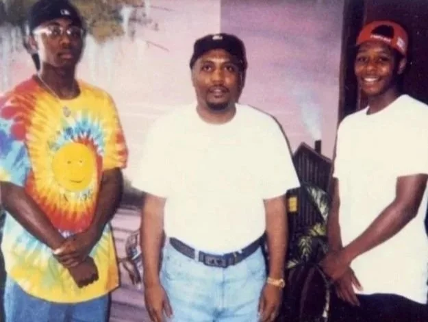 JT with sons John Jr. and Dedric in the visiting room for death row at Angola Prison, 1990s