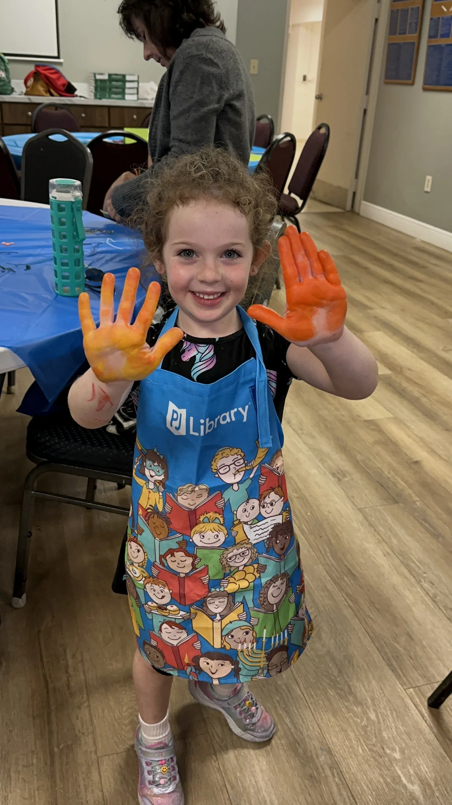 Child enjoying art at ECLC