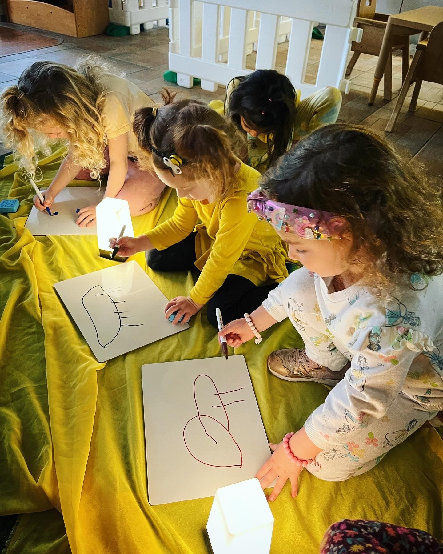A small group of children taking part in a creative activity at ECLC