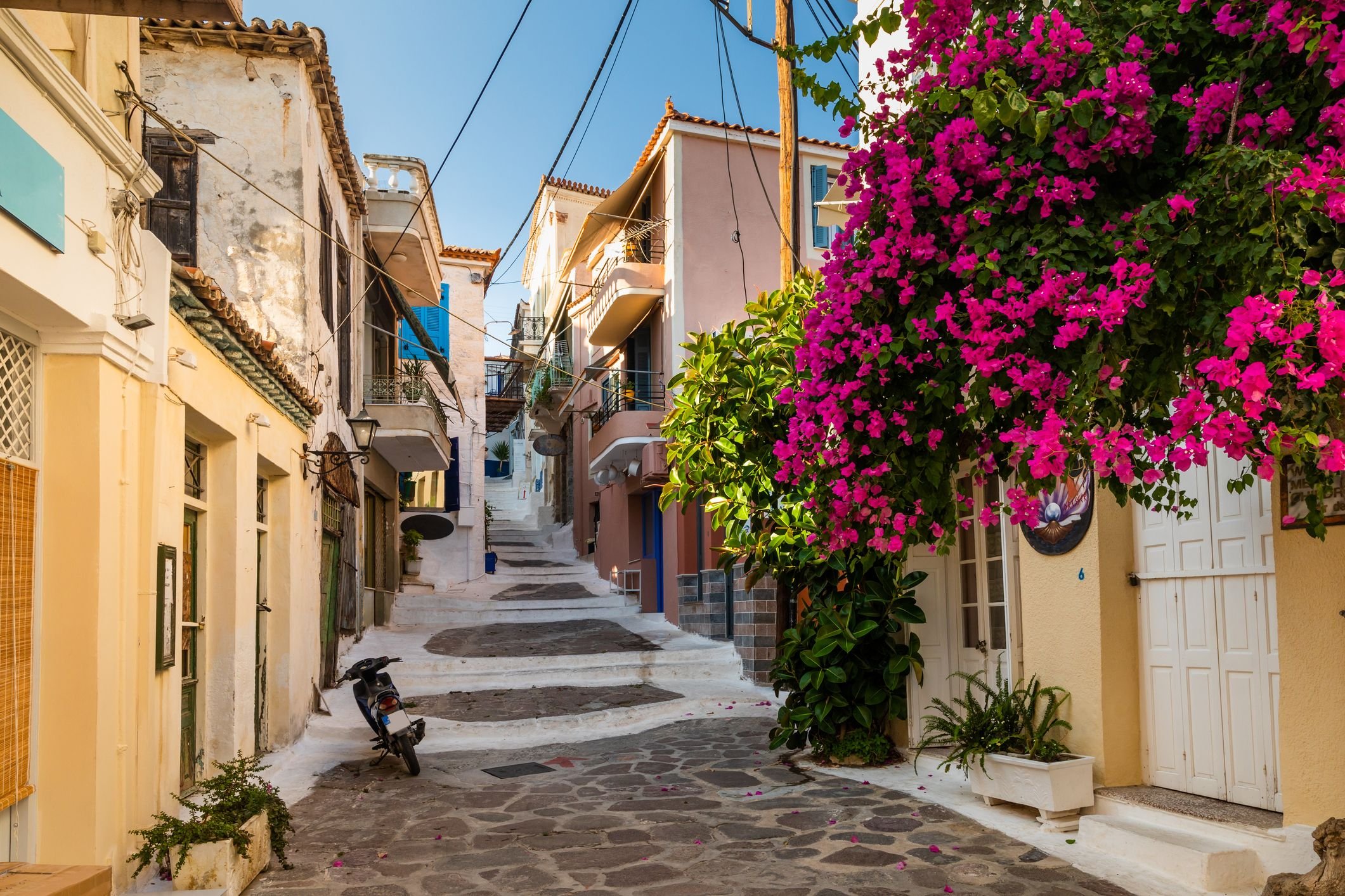 old-street-of-the-poros-island-greece-royalty-free-image-1134594042-1553793802.jpg