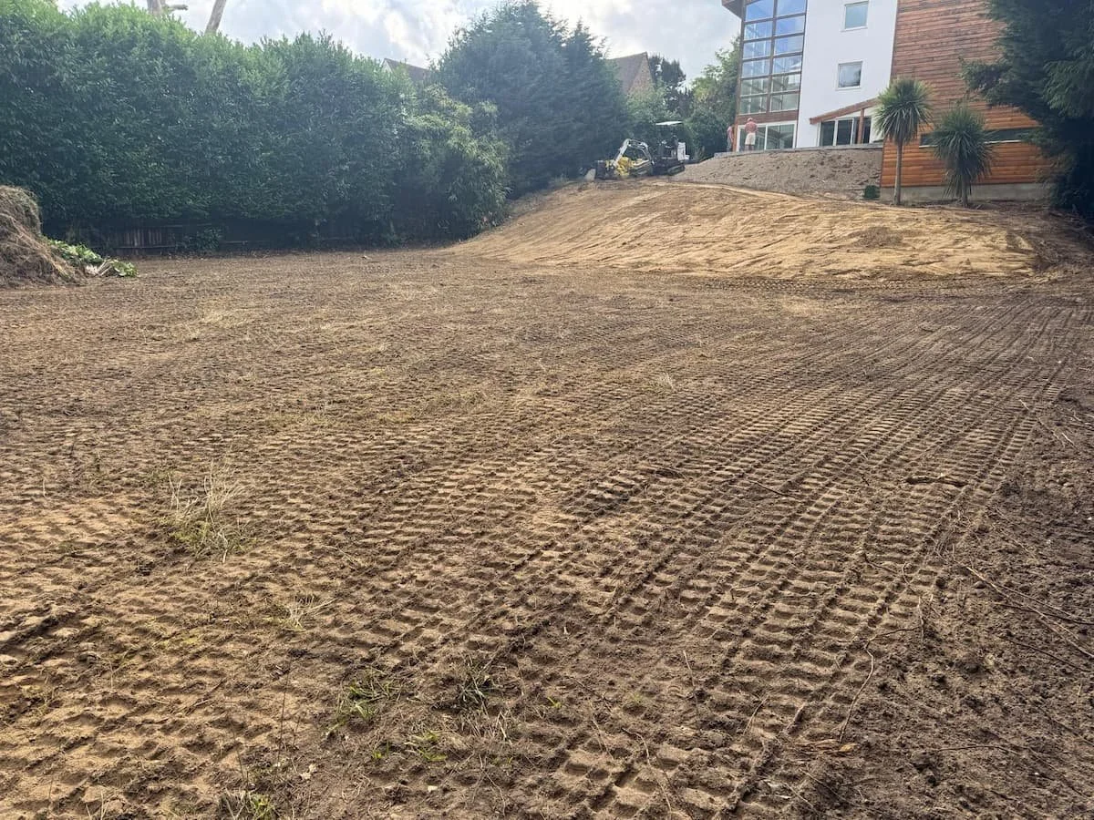 Final grading completed, leaving a smooth level surface ready for the next stage of landscaping.