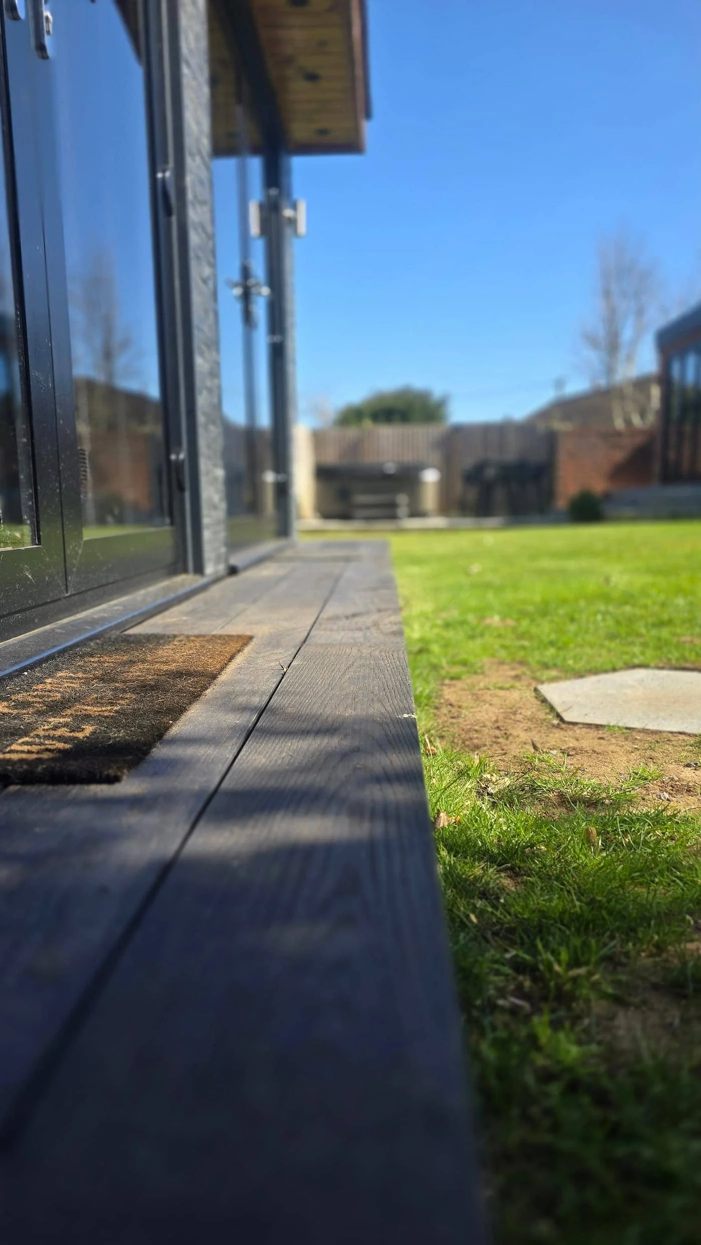 Close-up of the completed composite decking step.