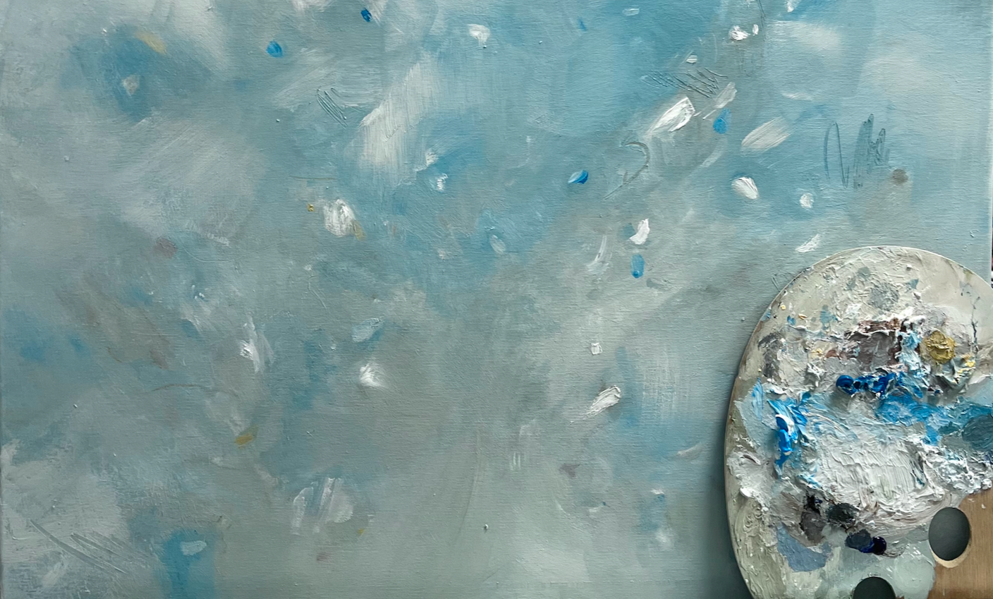 An abstract painting in shades of blue, white, and gray, with an artist's palette holding mixed paint in similar colors visible on the right side.
