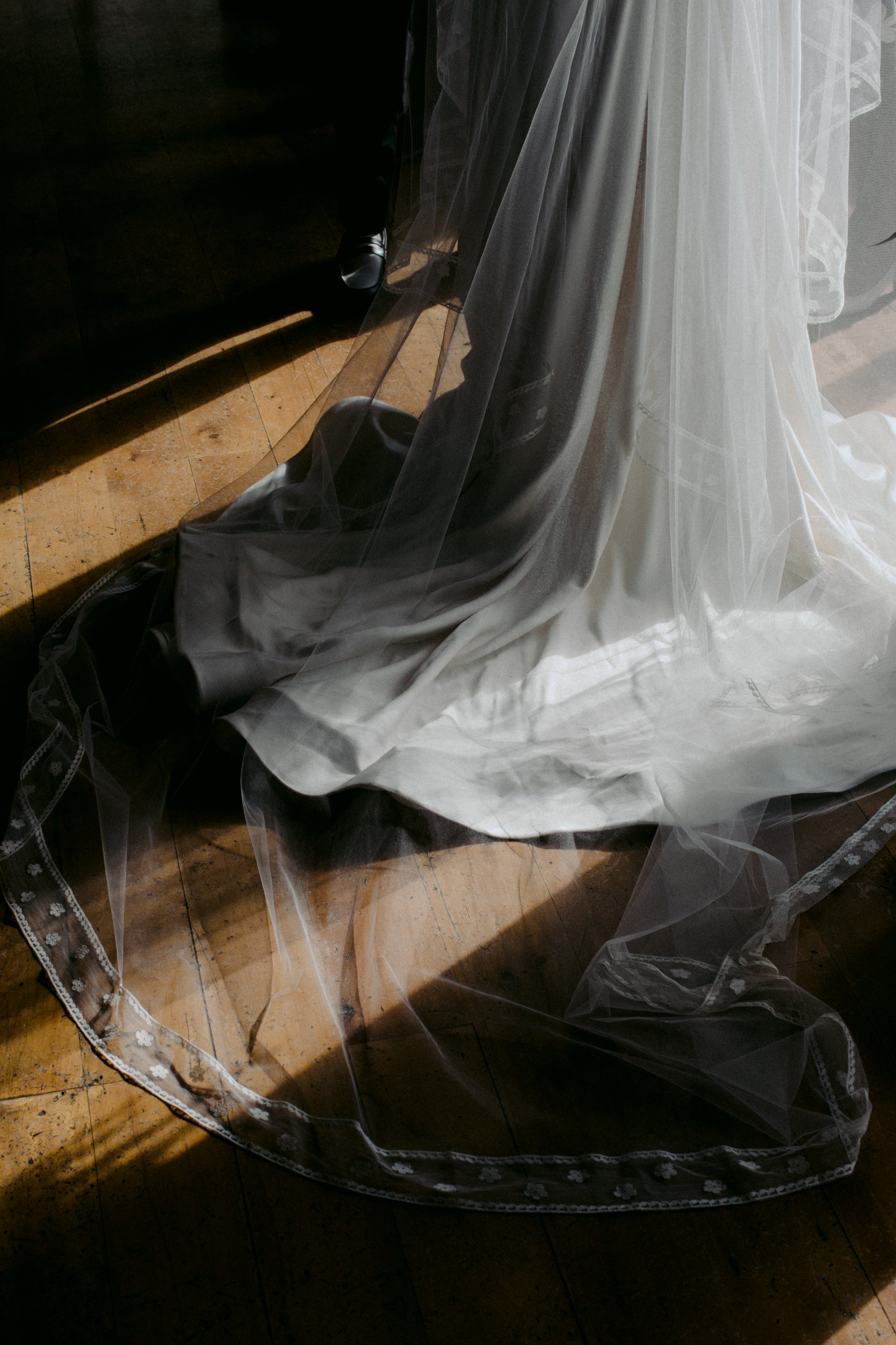 Close-up of Vinka Bridal dress and cathedral-length veil made from vintage Italian lace at Rippon — editorial wedding detail featured in Together Journal.