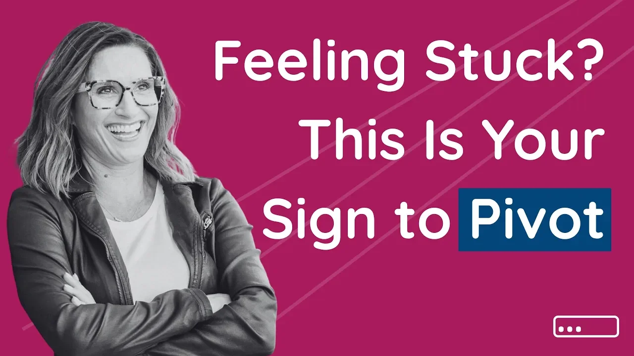 A woman with glasses and a leather jacket smiling with crossed arms against a magenta background with white and blue text that reads "Feeling Stuck? This Is Your Sign to Pivot"