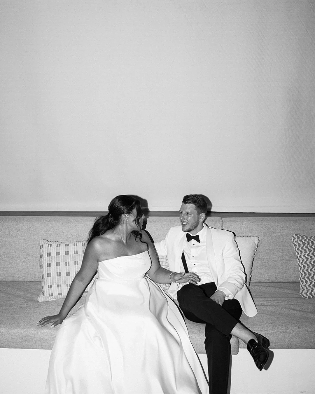 Destination weddings always end up giving me moments like this.

Two people naturally falling into each other, laughing about something only they know.
No cue from me, just a quick moment that happened on its own.

These little moments of connection 