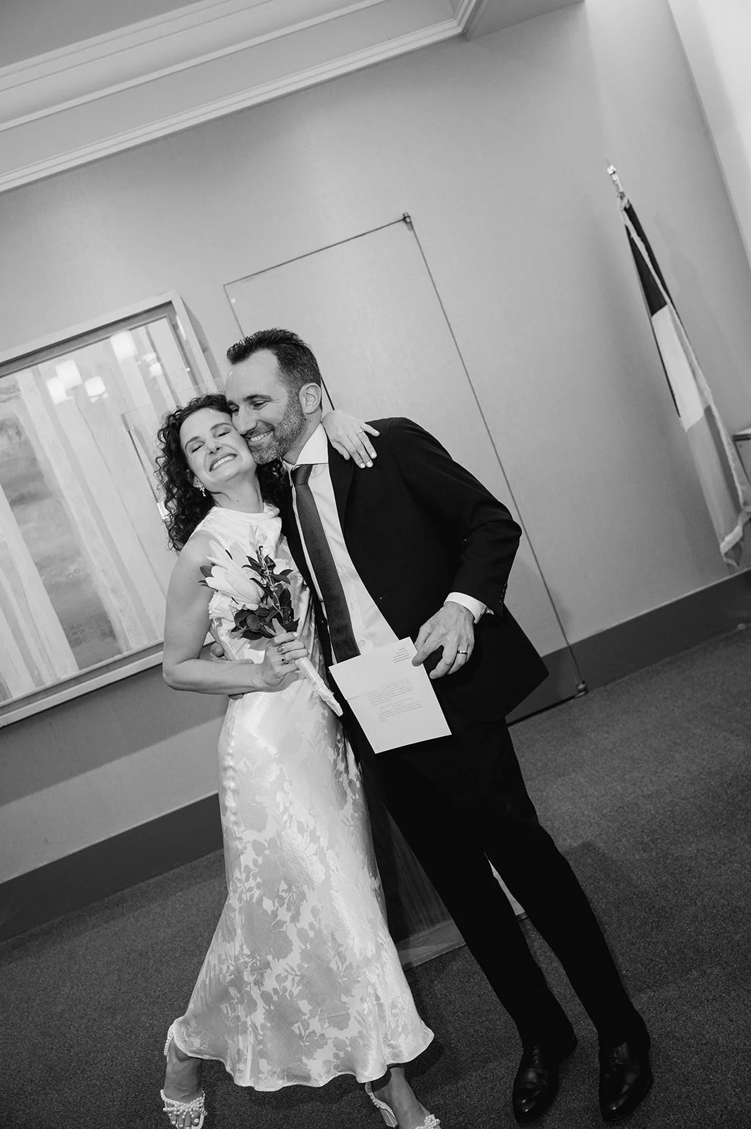 Newlyweds during their New York City Hall wedding