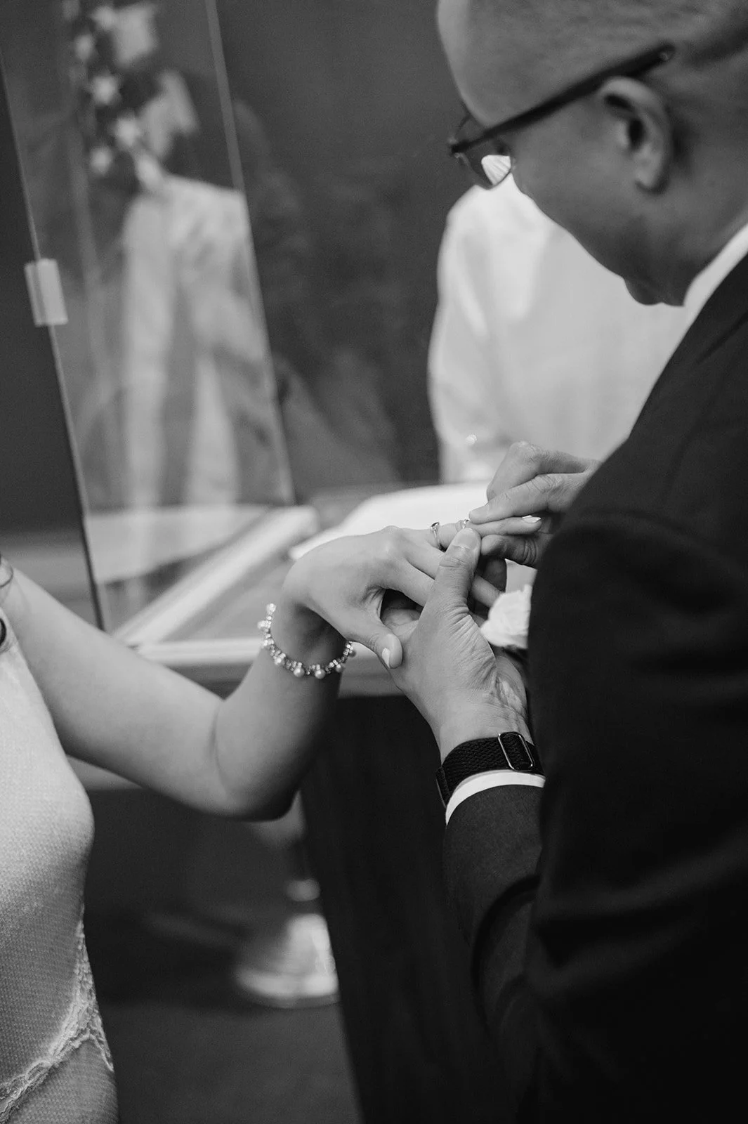 Ring exchange during a New York City Hall wedding ceremony