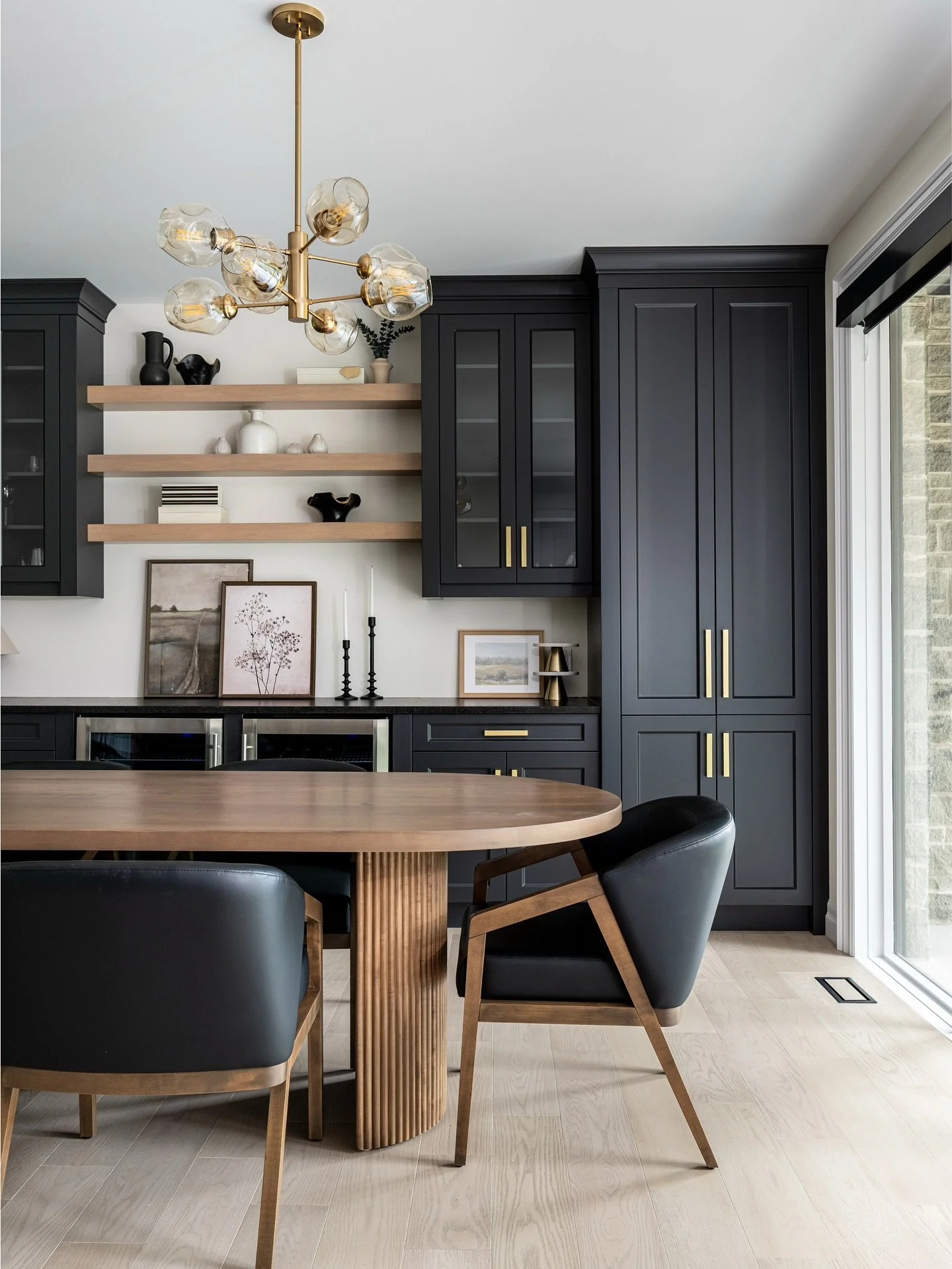 When you&rsquo;re working with a larger built-in or full wall of cabinetry, scale becomes everything. Balancing that visual weight with the right furniture in front of it keeps the room feeling intentional, grounded, and proportionate. This custom de