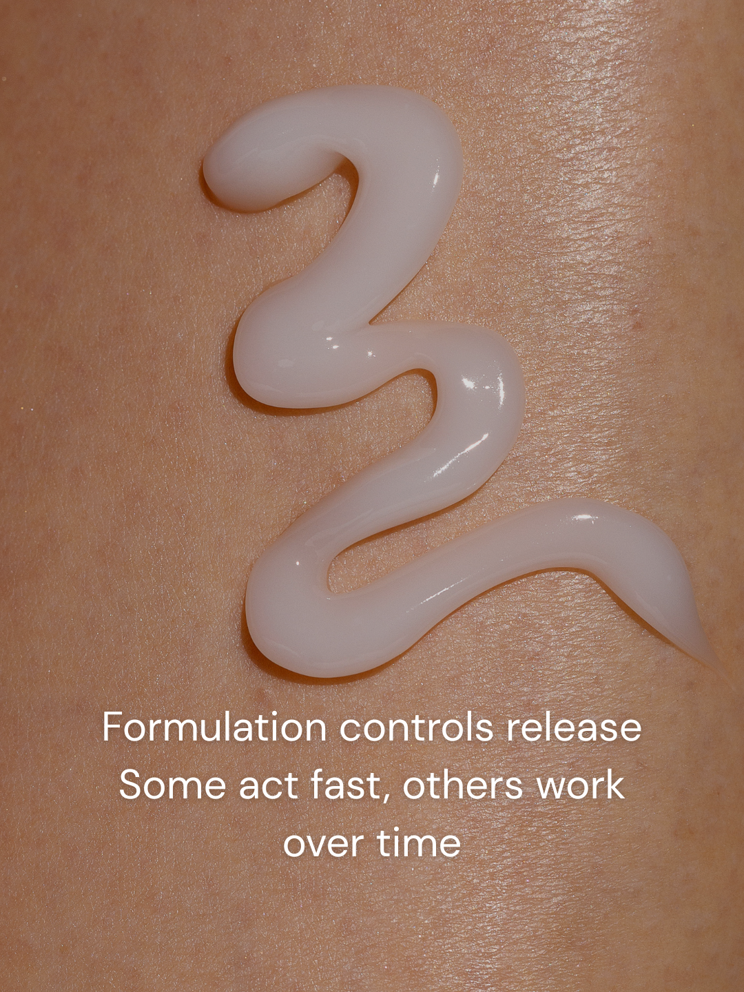 Lotion spreading and absorbing on skin surface to illustrate fast versus slow ingredient release