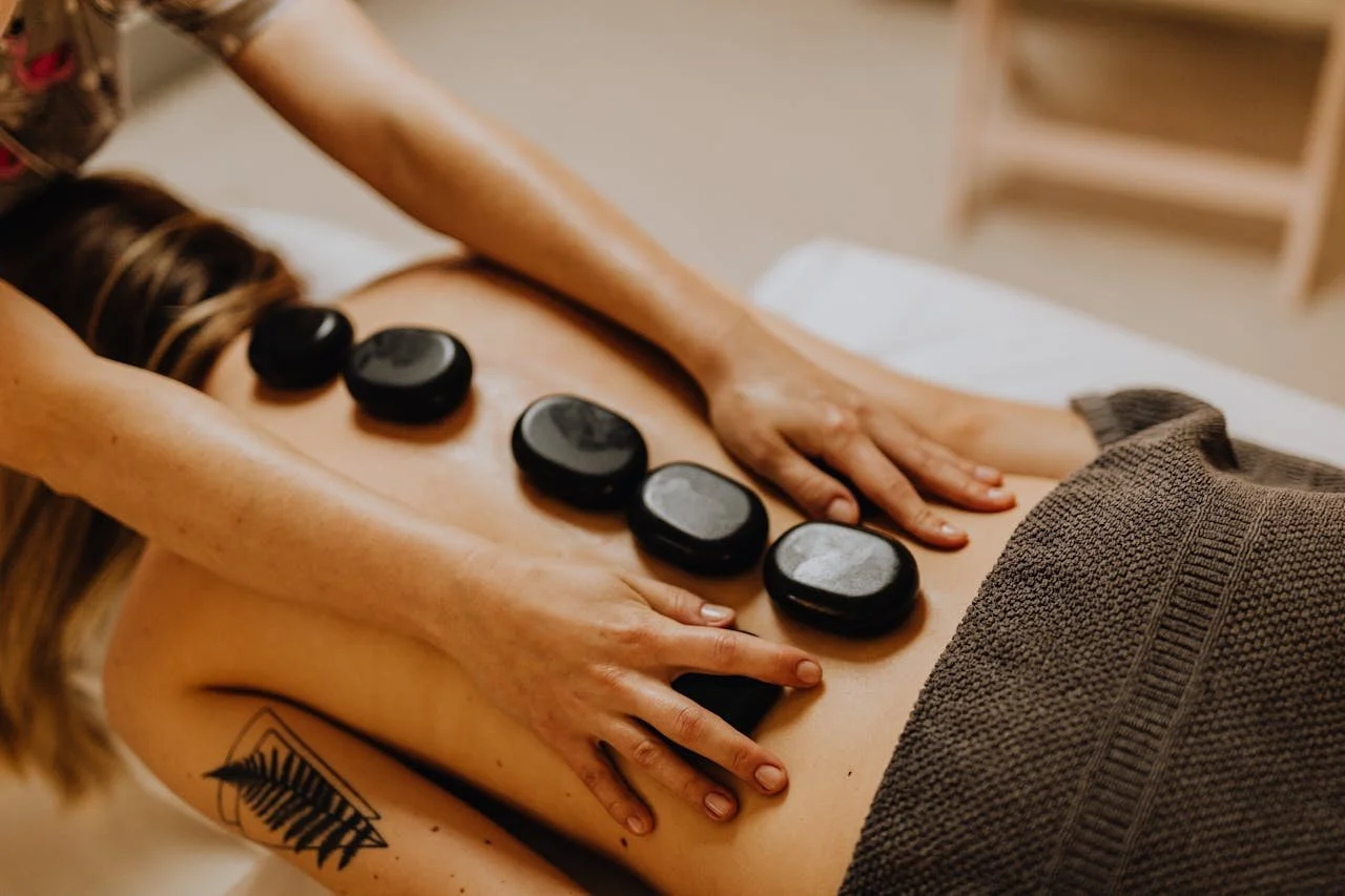 Signature ritual combining hot stone massage and personalised facial therapy