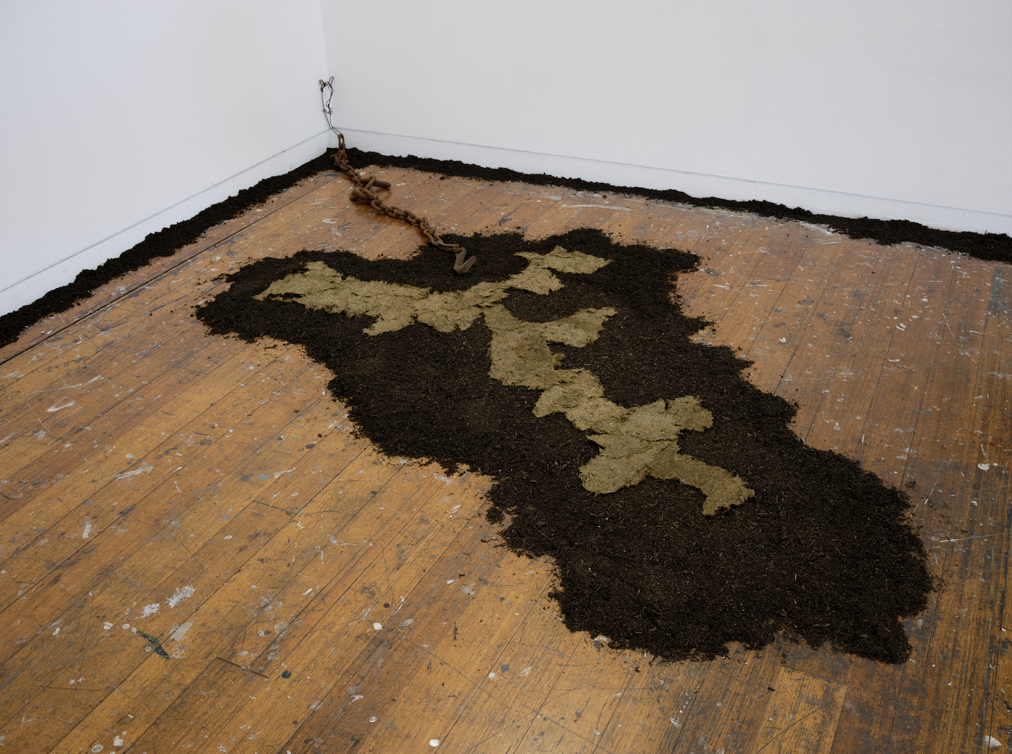 'Earth', grass paper, rusted chain, dirt, 2024