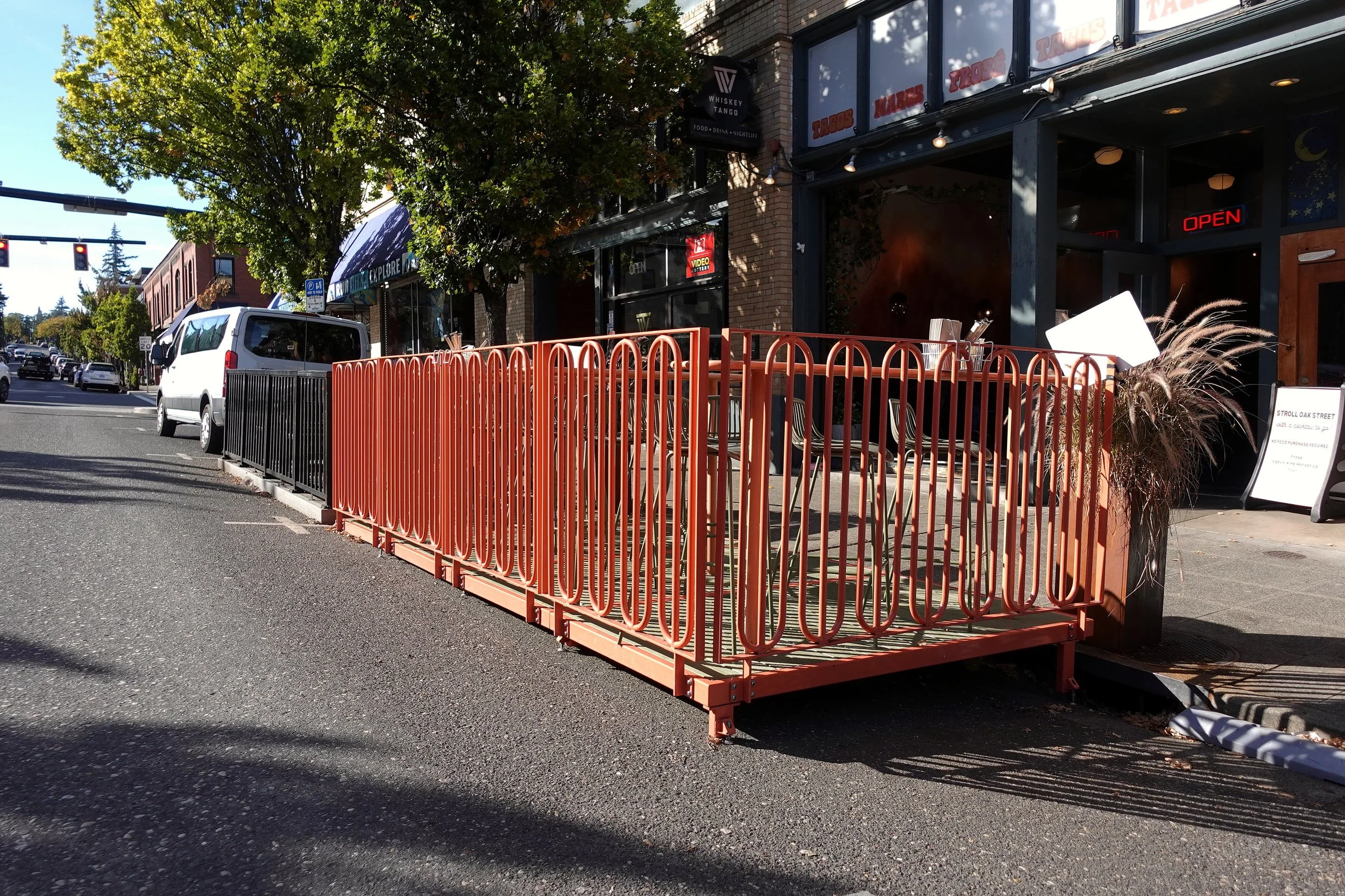 Completed Love & Hominy parklet in downtown Hood River, Oregon, designed and fabricated by de stijl FORMS as a modular steel streetscape structure.