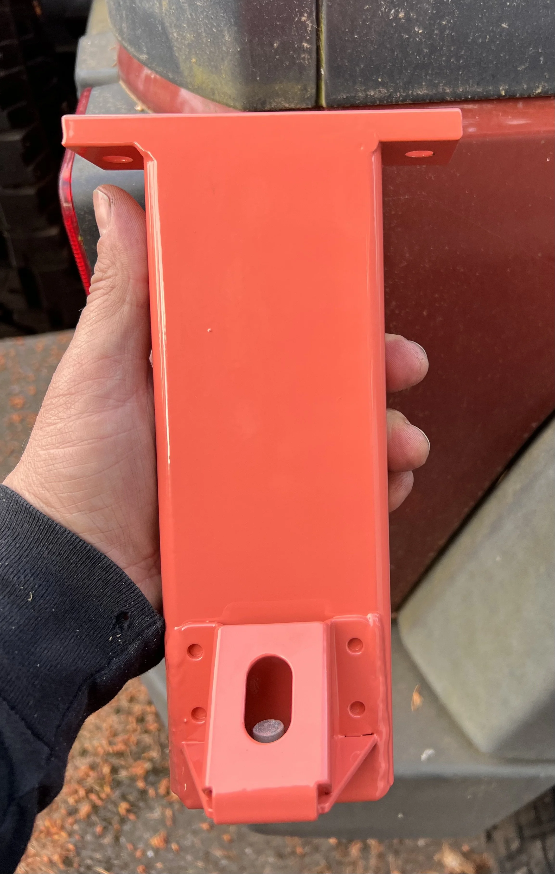 Powder-coated removable steel leveling leg fabricated for the Love & Hominy parklet in Hood River, Oregon, designed to level and connect the modular structural sections.