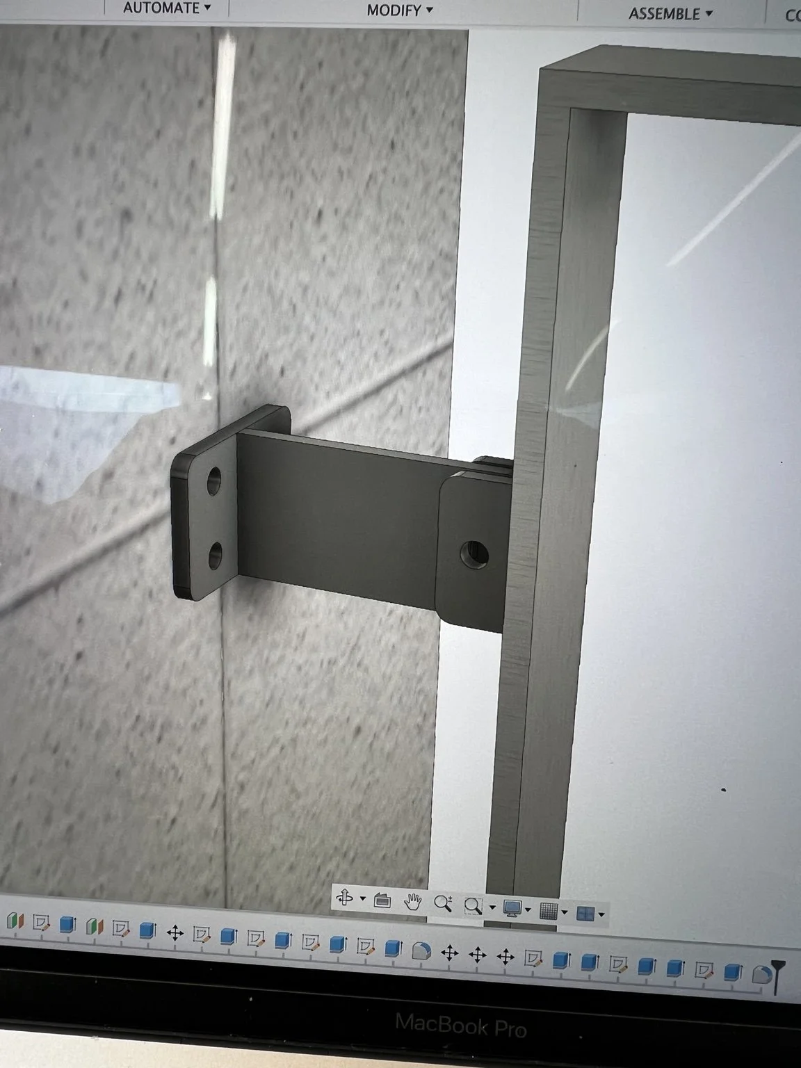 Custom stainless steel mounting connection developed for The York railing system in Lake Oswego, Oregon, designed around the project’s specific architectural and structural conditions.