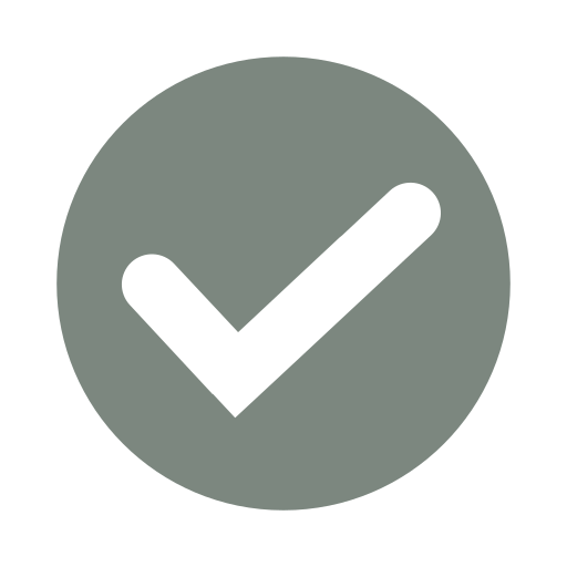 Gray circle with a white check mark inside.