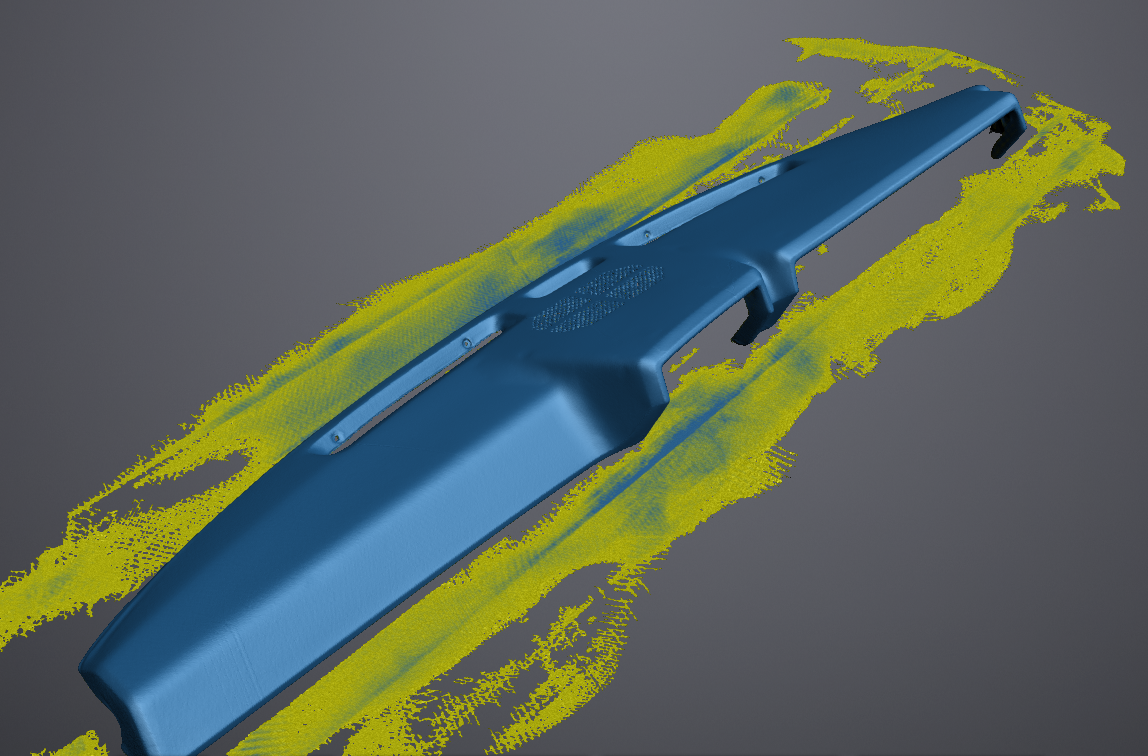 3D model of a blue car bumper on a gray background with yellow scanning outlines.