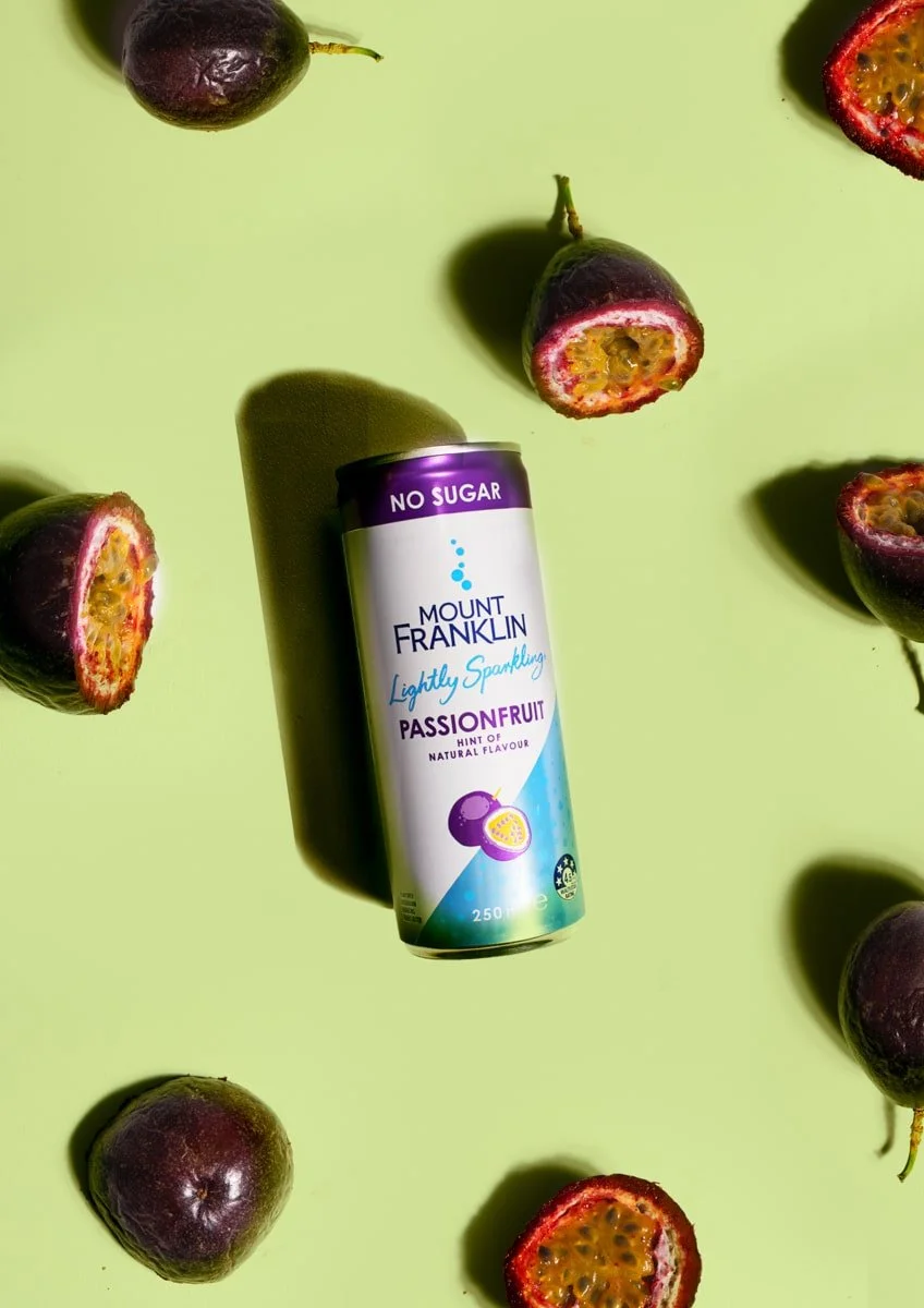 passionfruit flavour can composite on lime background with passionfruits