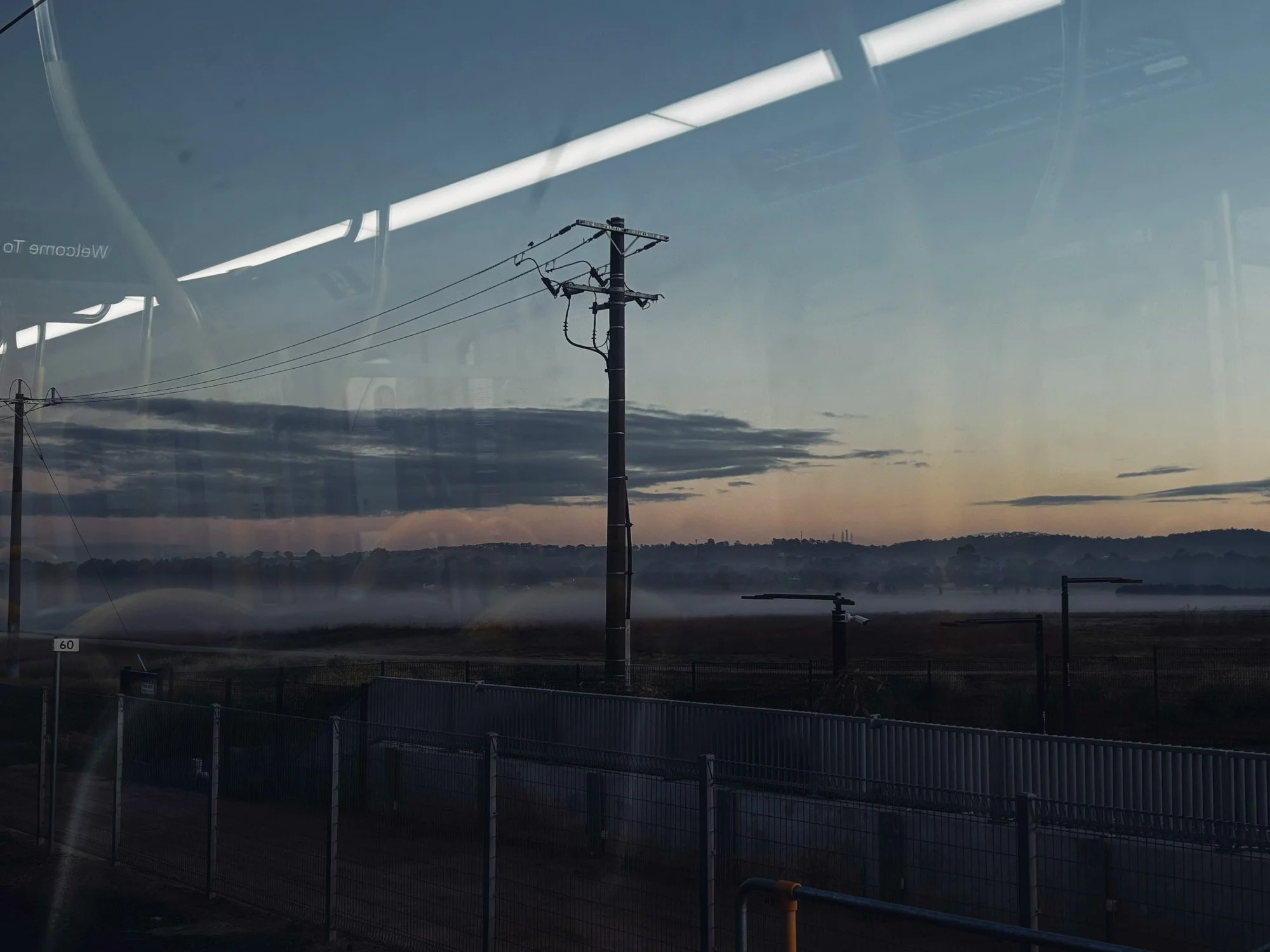 metro train reflections on a early morning