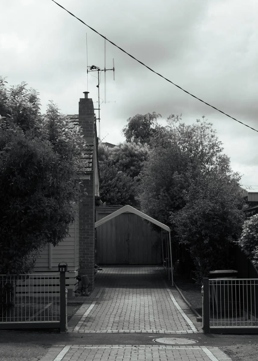 different house building styles, focusing driveways