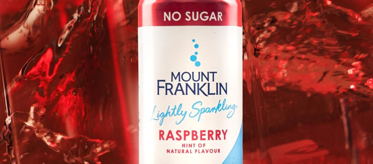 detail shot of raspberry flavour in water background