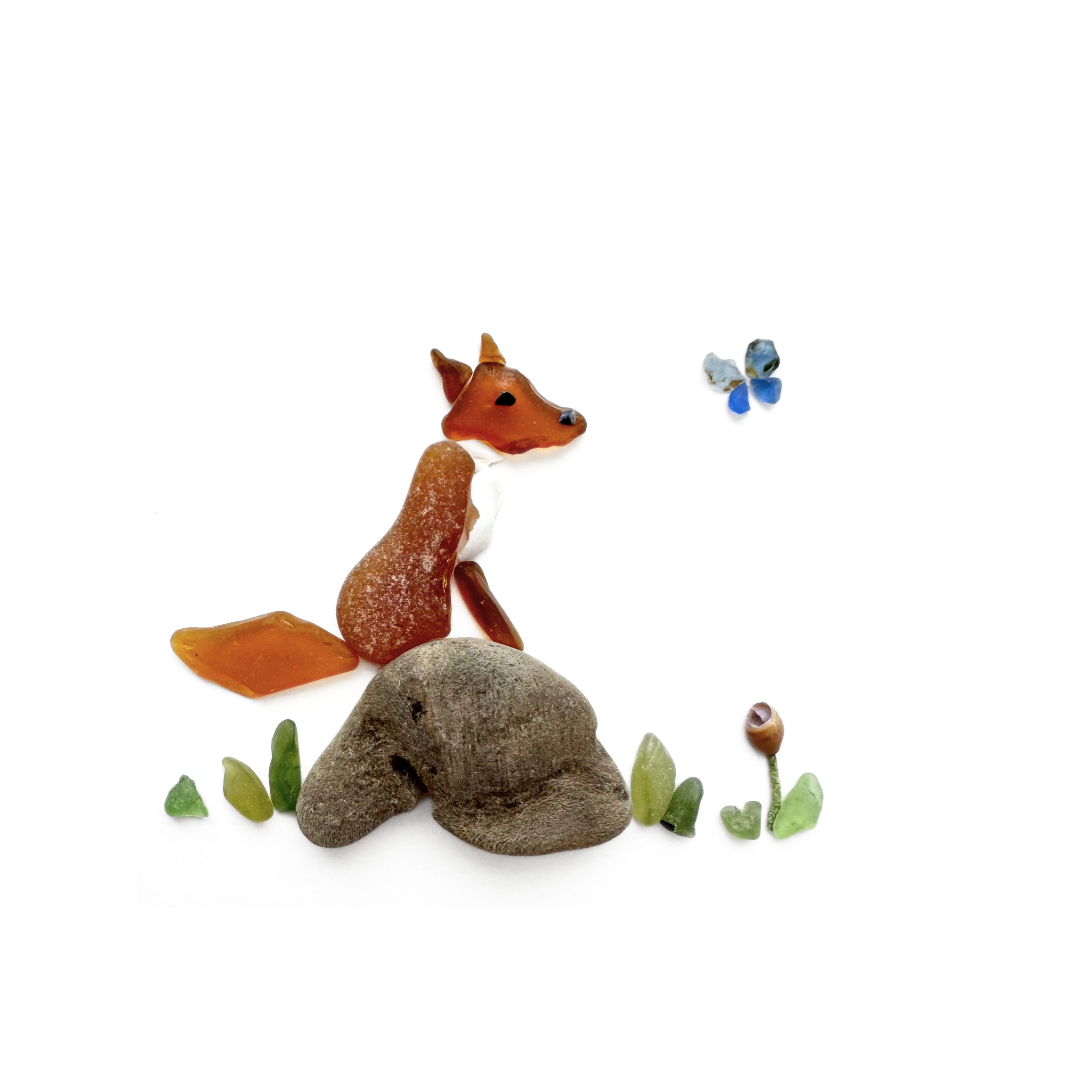 A curious sea glass fox watches a tiny blue butterfly from its woodland perch.