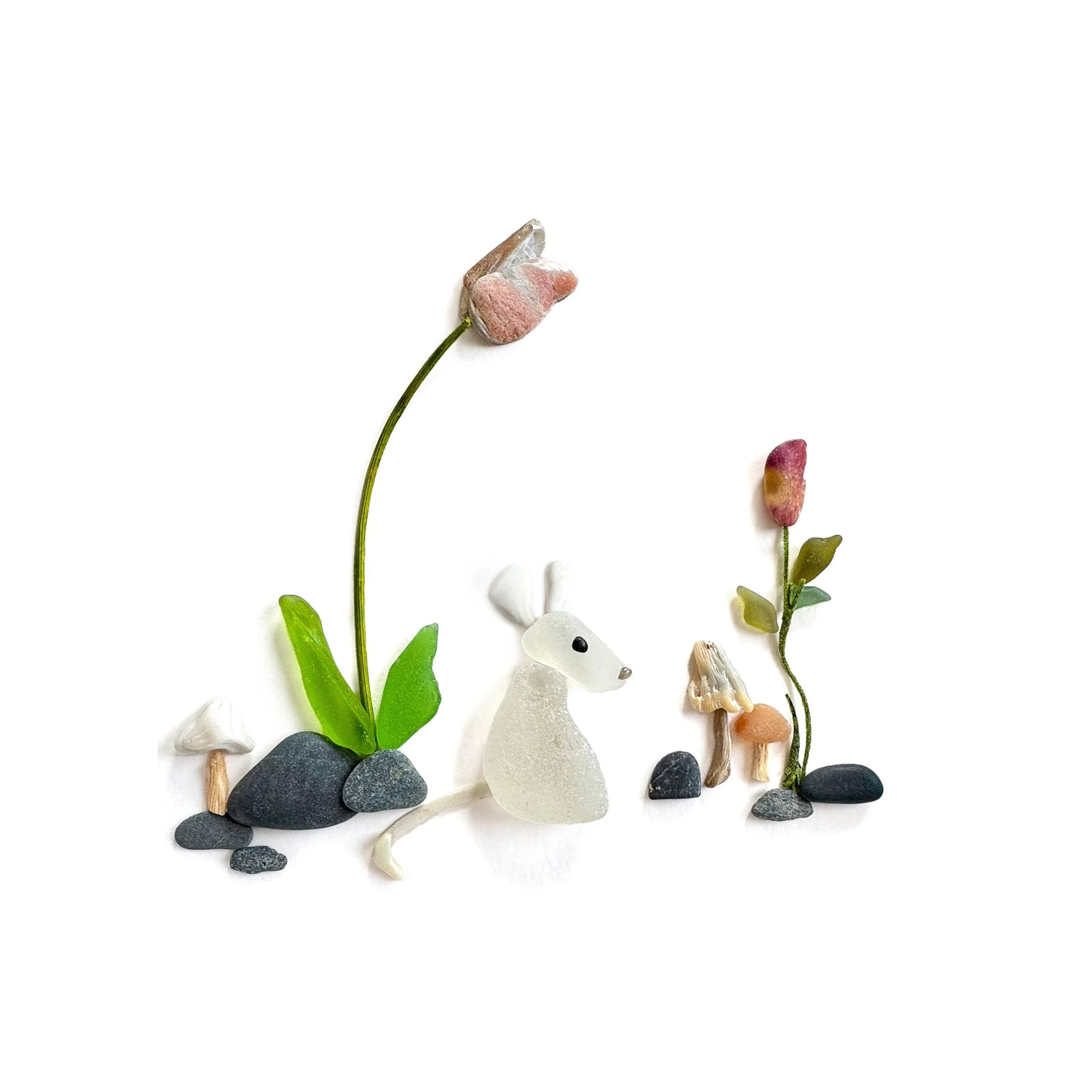 Original sea glass woodland artwork featuring a tiny white mouse among beach stones, miniature mushrooms, green leaves, a tall pink abalone tulip, and a small pink flower bud against white background.