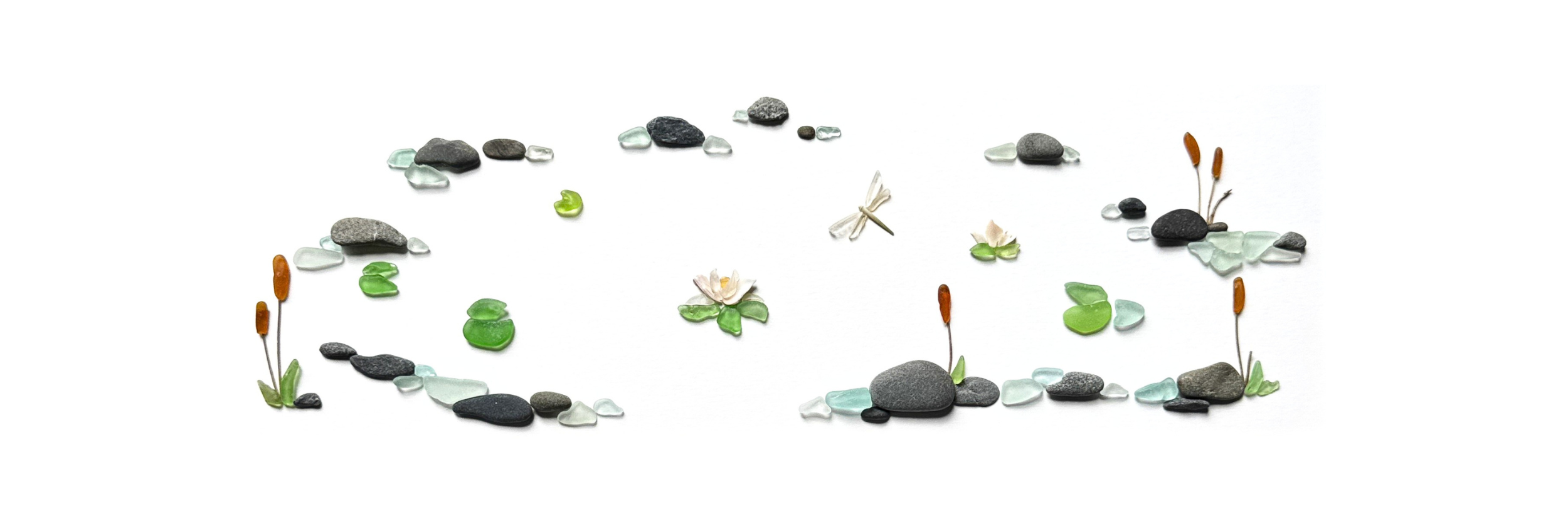 Original minimalist sea glass artwork depicting a peaceful pond with water lilies, dragonflies, cattails, and smooth beach stones.