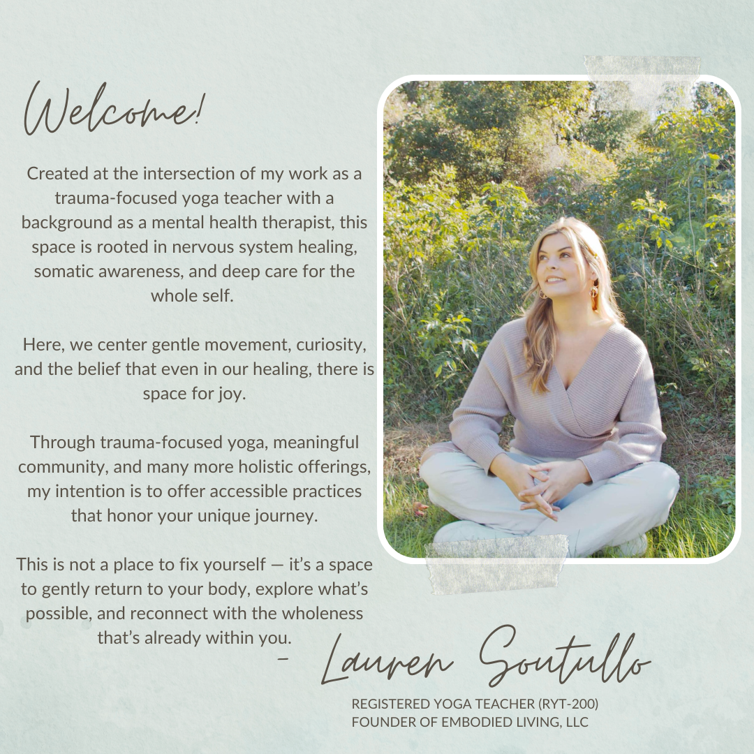 A woman sitting cross-legged outdoors among greenery, smiling and looking up, with a welcoming expression on her face.
