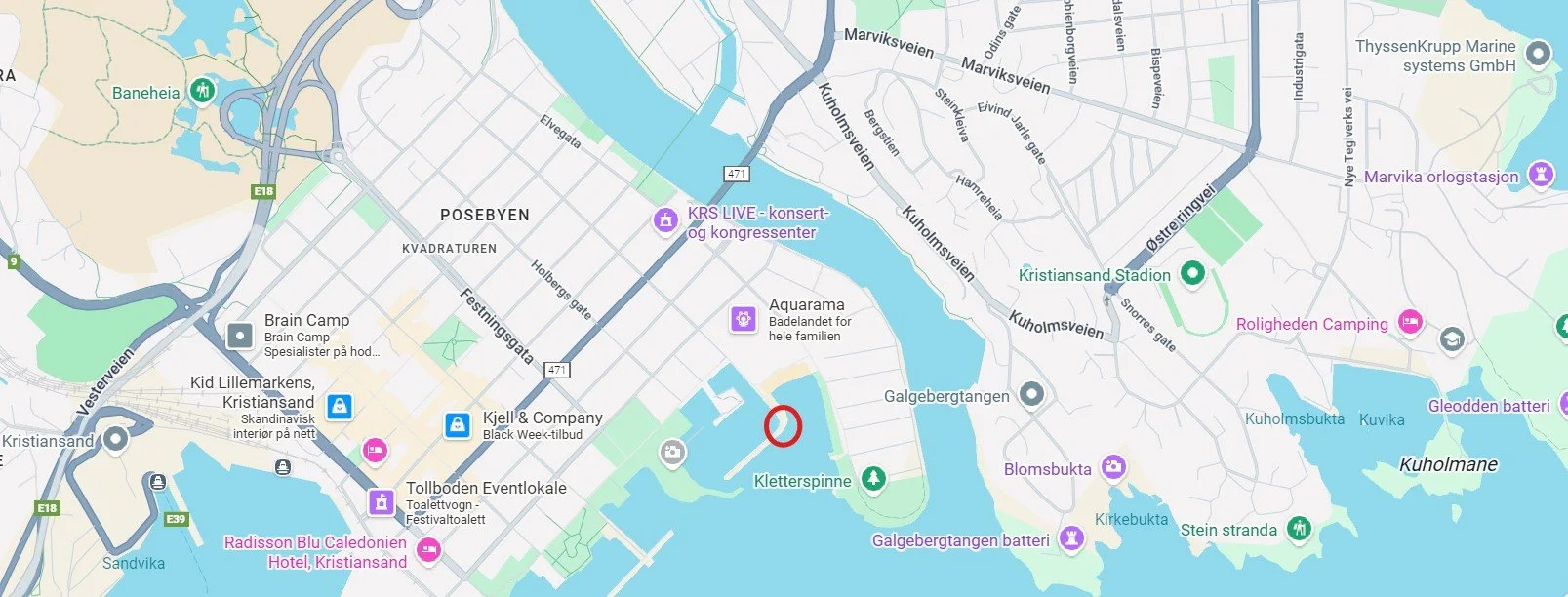 Map of Kristiansand, Norway, showing streets, lakes, and landmarks including Kristiansand Stadium, Aquarama, and Kletterspinne.