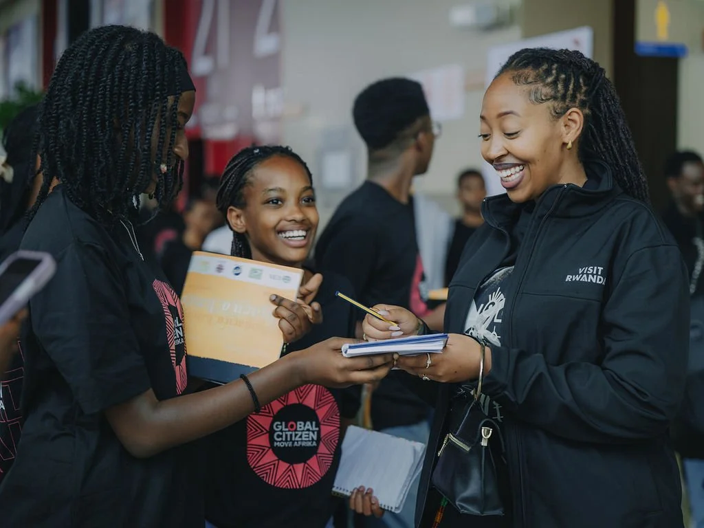 Participants engage with organizers during the youth forum on relationships, consent, and health.
