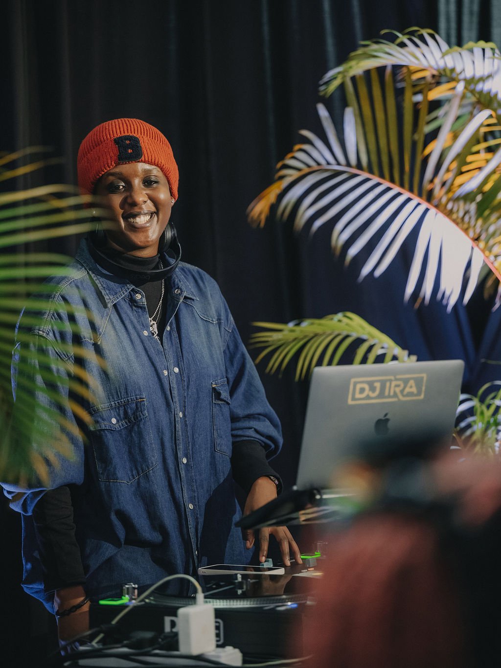 DJ Ira performs during the youth forum at BK Arena in Kigali.