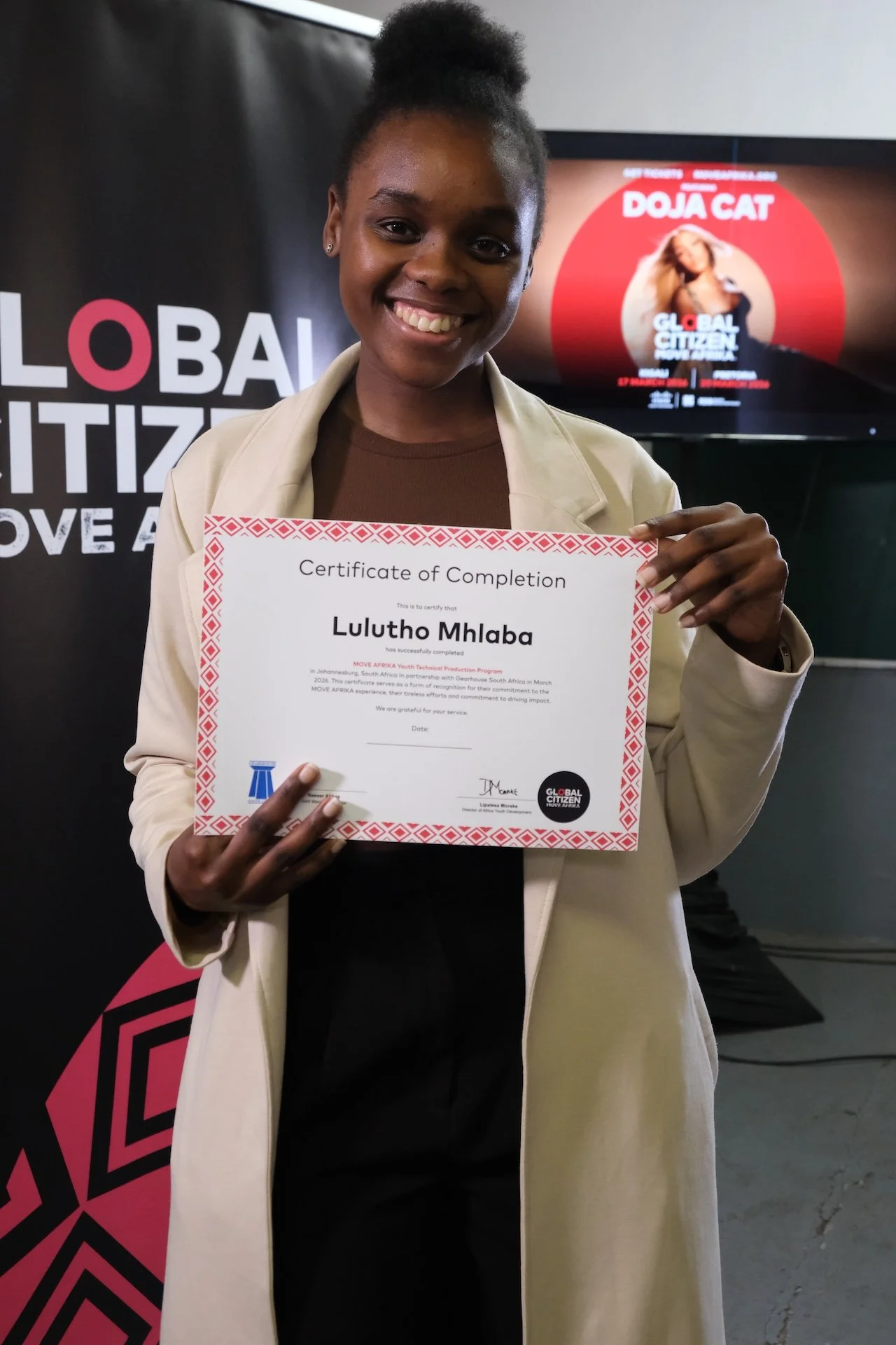  Lulutho Mhlaba celebrates completing the Move Afrika Youth Technical Production Program, delivered in partnership with Gearhouse South Africa in March 2026. 