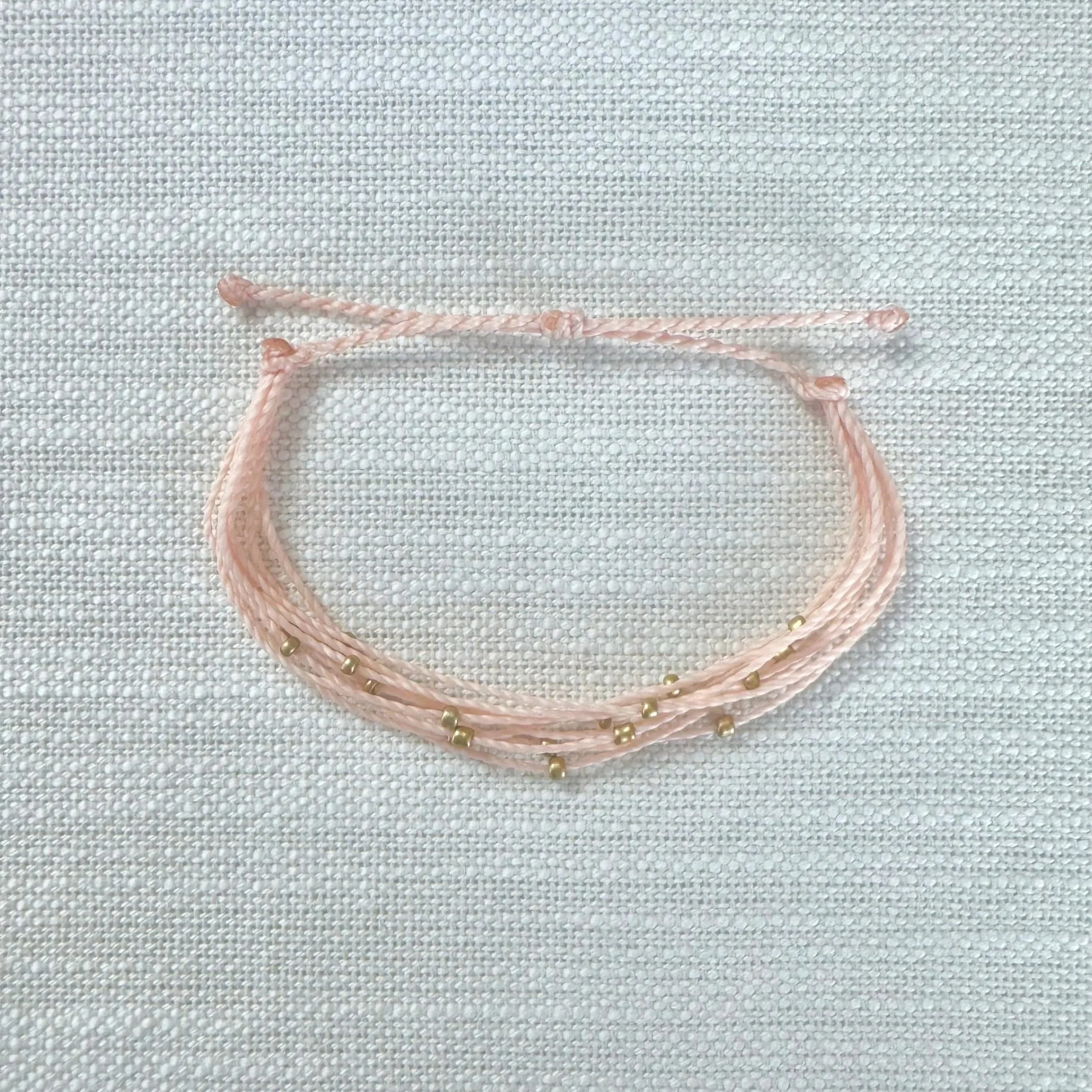 Pink, Gold Beaded Strand Bracelet