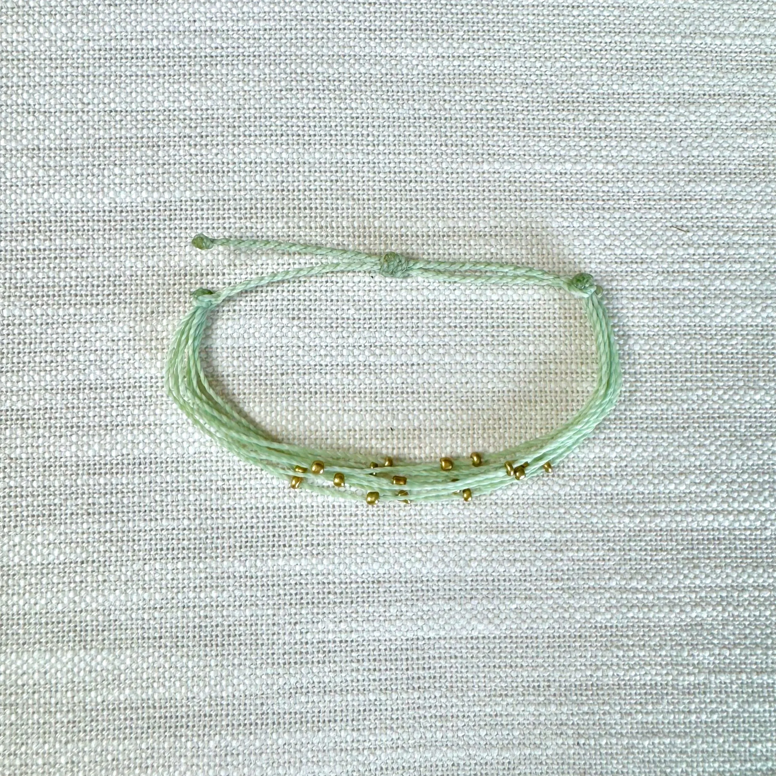 Green, Gold Beaded Strand Bracelet