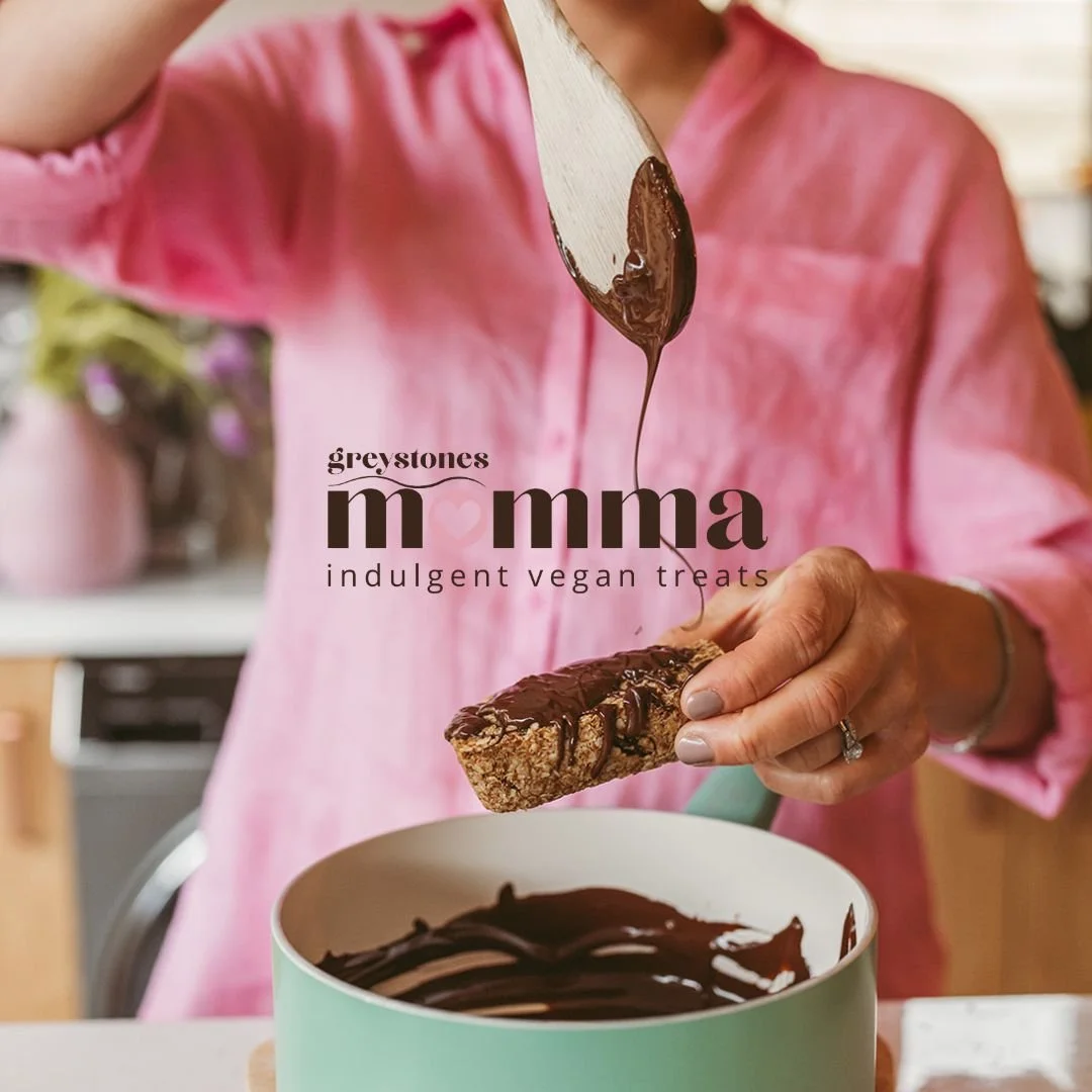 Person drizzling chocolate on vegan treat