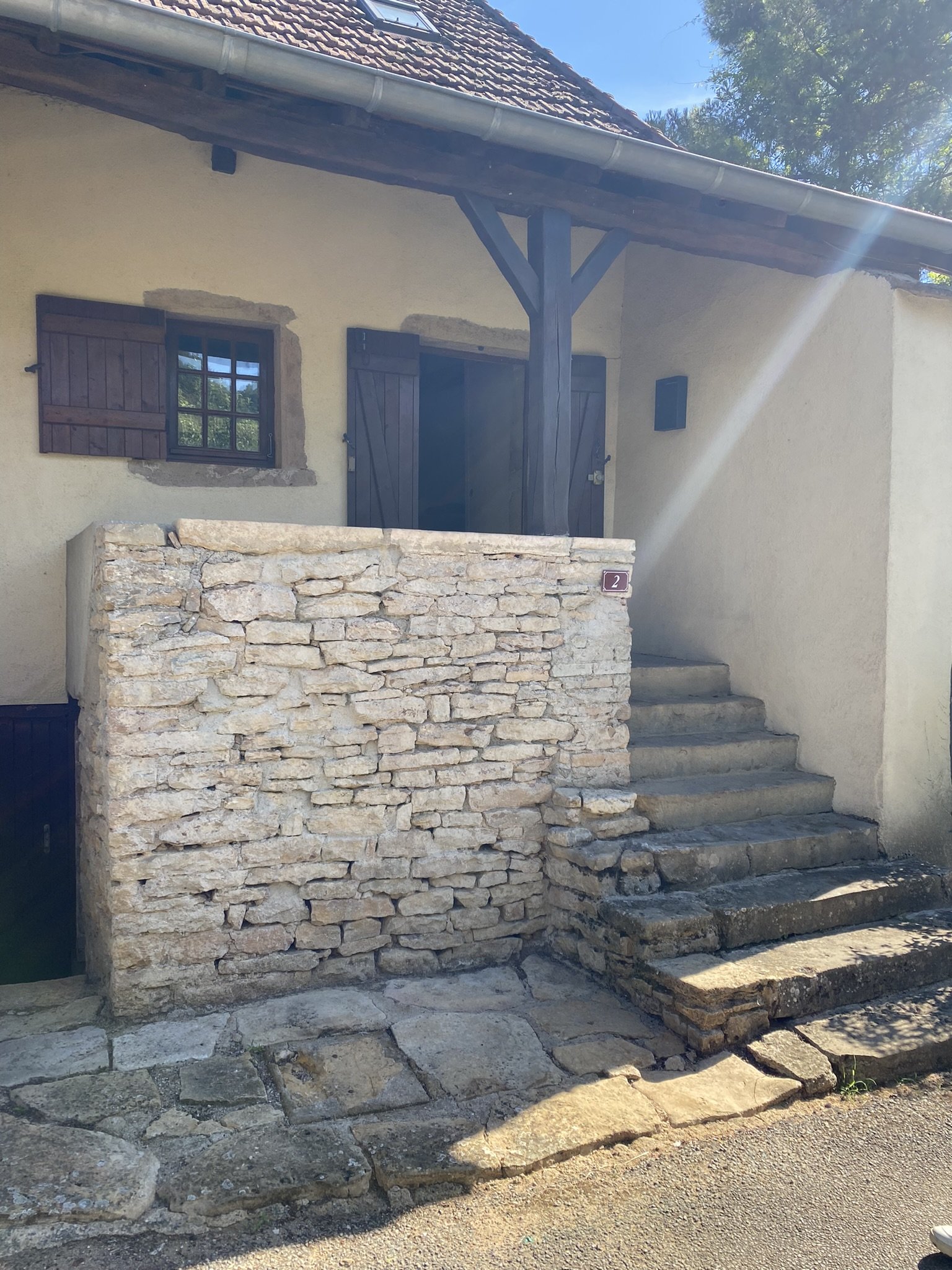 Le Refuge gîte entrance with traditional stone steps, Burnand, Burgundy