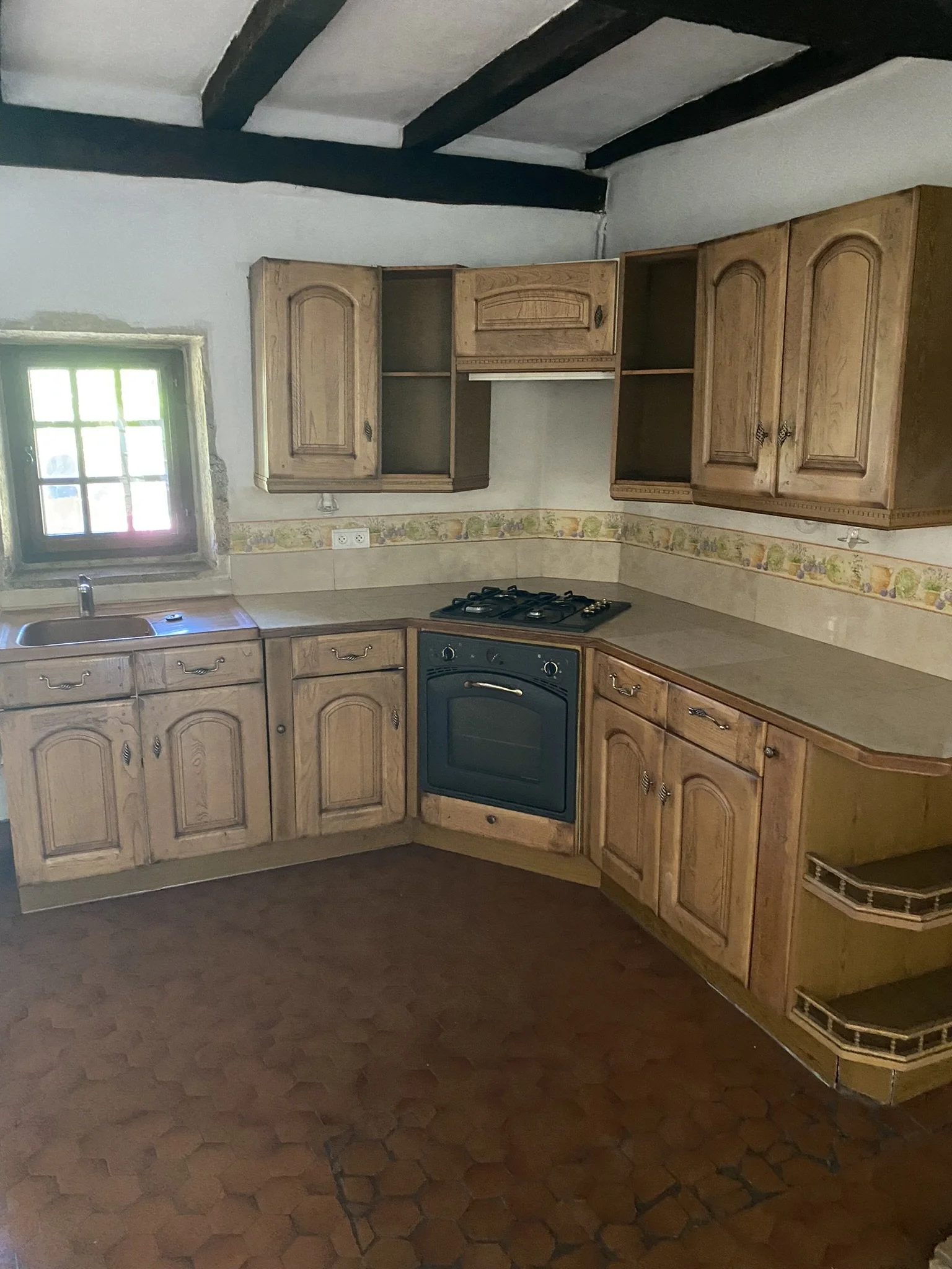 Fully equipped kitchen inside Le Refuge gîte, Burnand, Burgundy