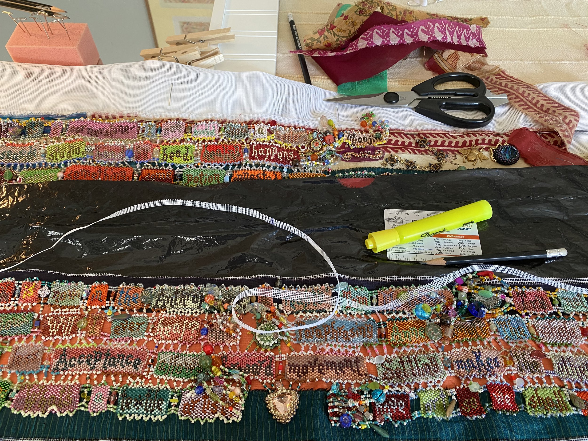 Stitching together the strips.