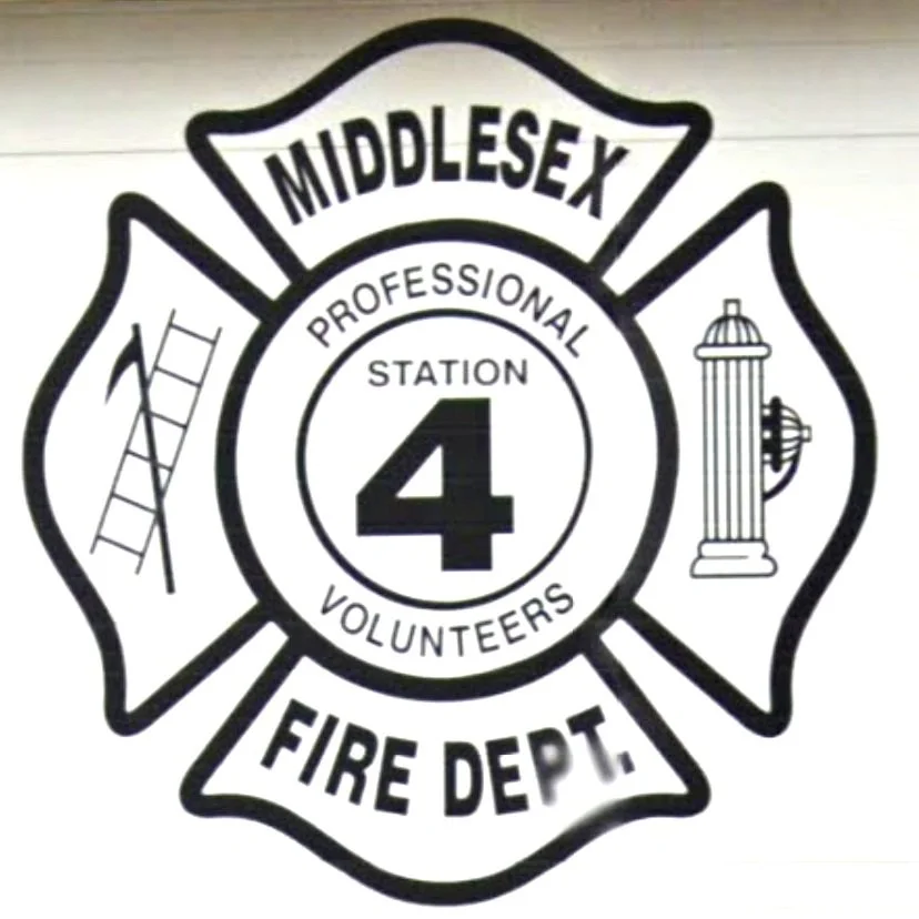 Middlesex Fire Department badge with a fire ladder on the left and a fire hydrant on the right, with the text "Middlesex Professional Station 4 Volunteers Fire Dept."