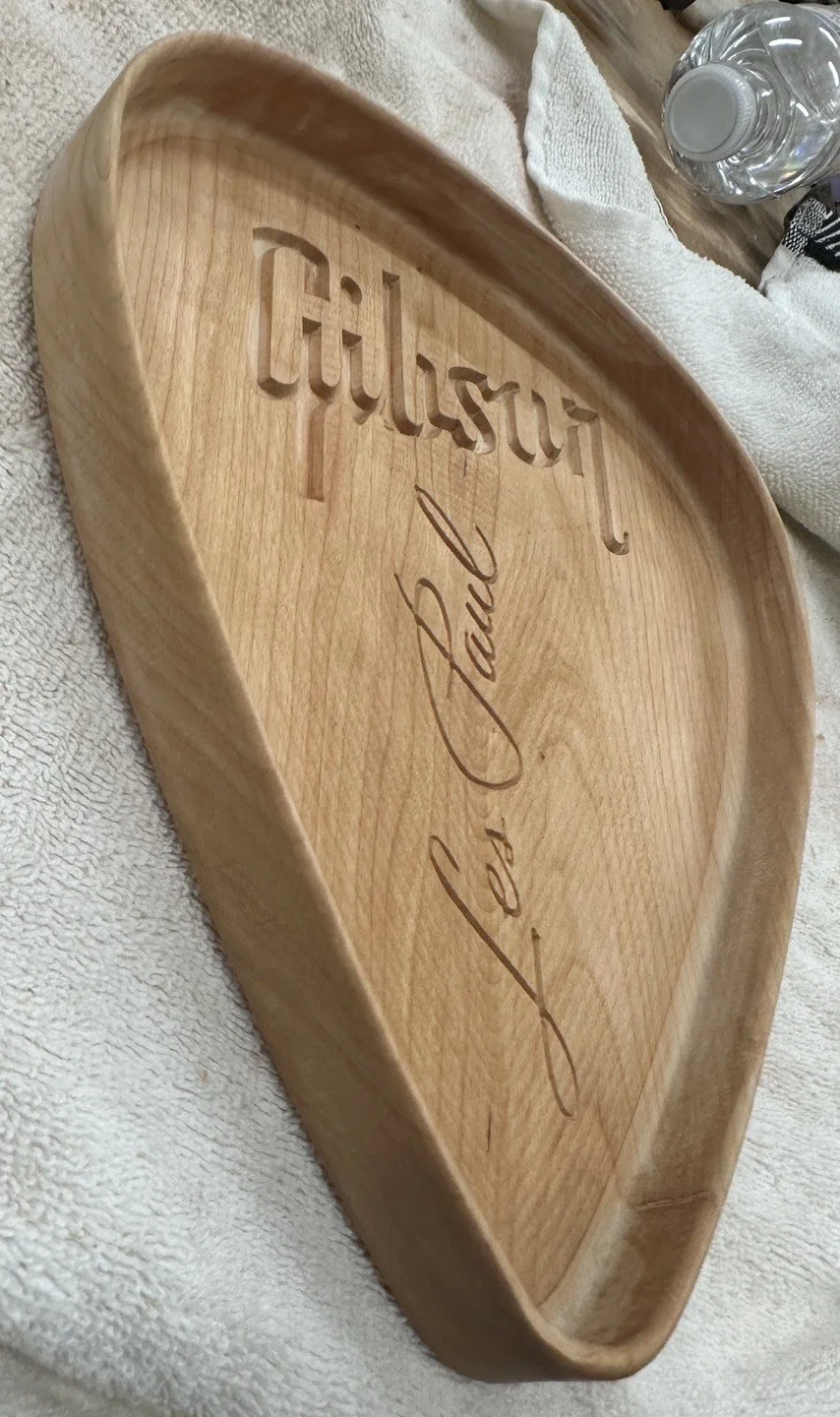 Wooden serving tray with the words "Culinary Pad" engraved in capital letters and "les Jules" in cursive.