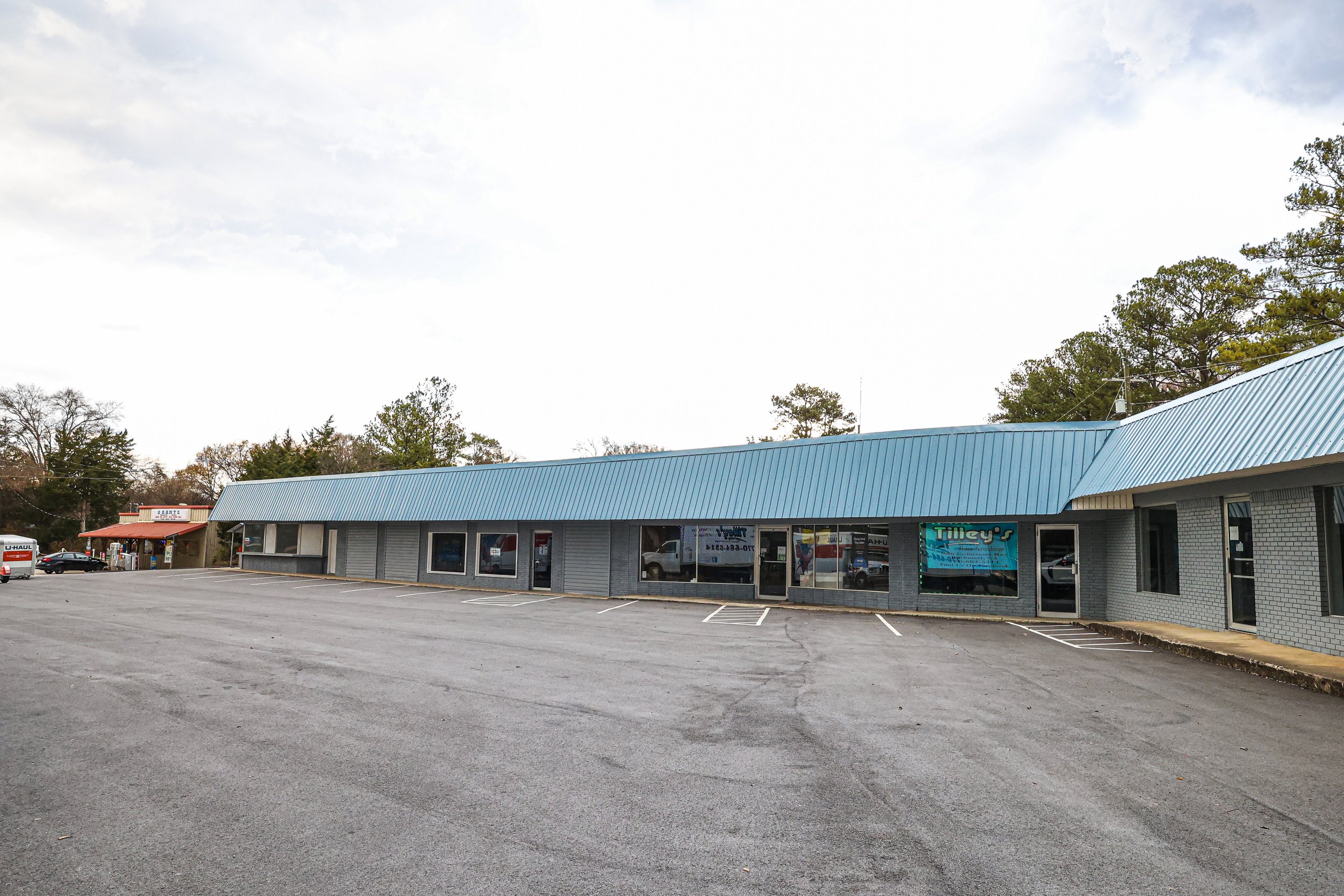 1Source Industries Commercial Construction & Roofing Nationwide | Parking Lot Construction | Commercial Exterior Painting in Georgia, Florida, Tennessee, Alabama, and surrounding areas