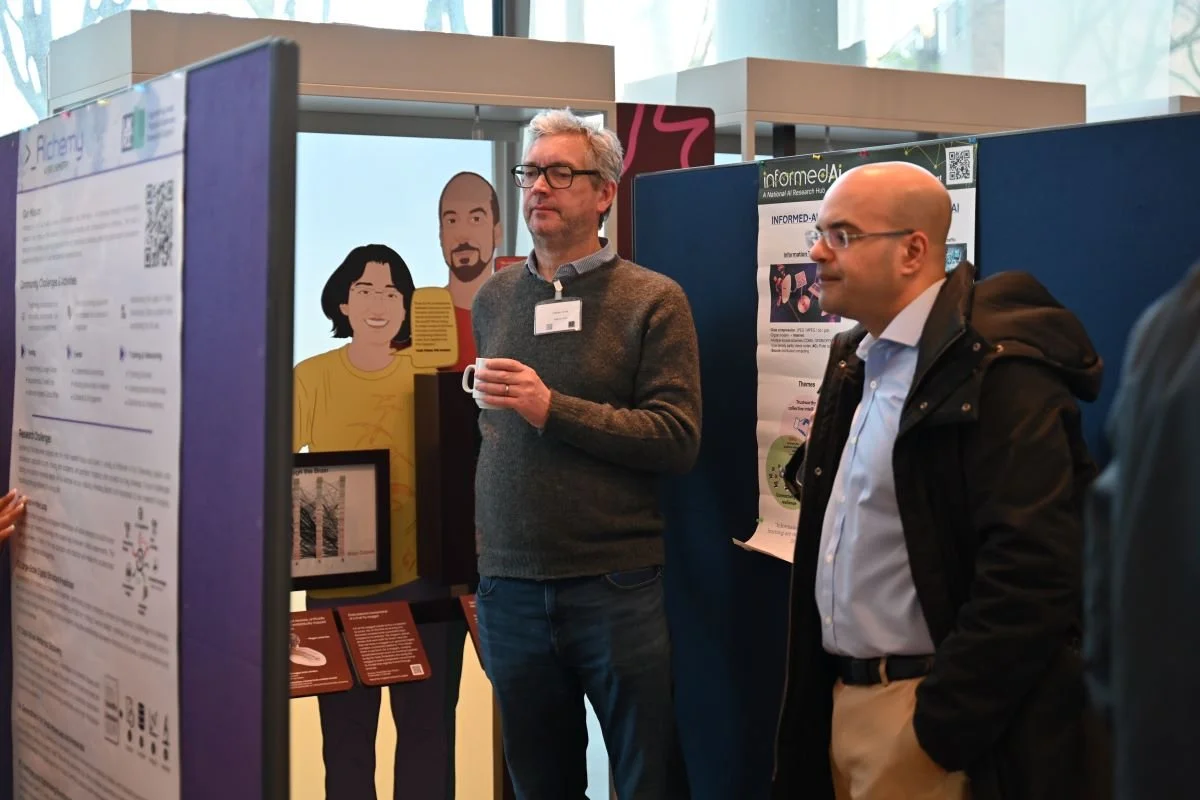  Attendees viewing the poster exhibition at the Gen AI Hub Launch (credit: Michelle McGrath) 