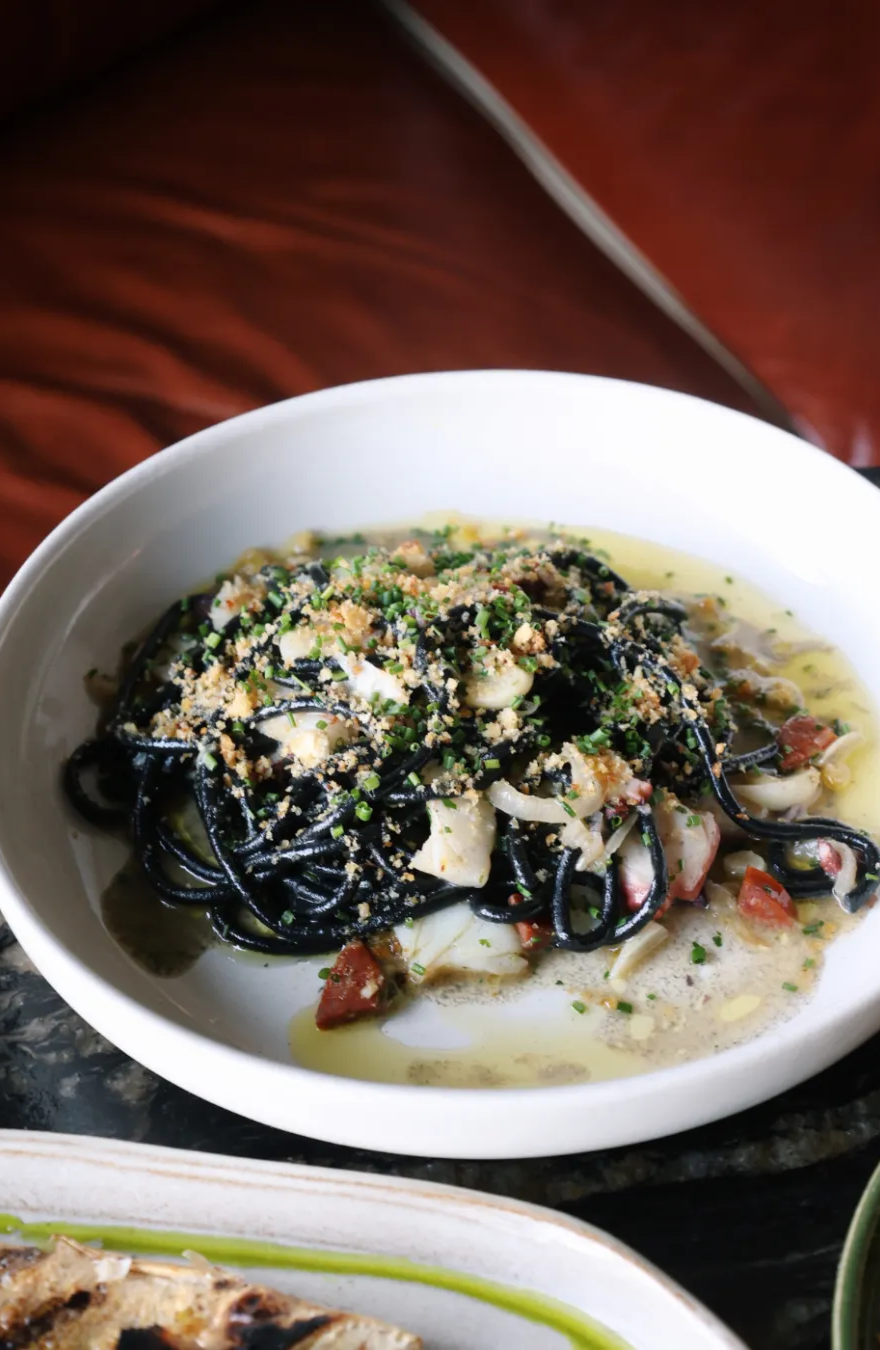 A shot of the hand-made squid ink pasta on Red Herring's menu
