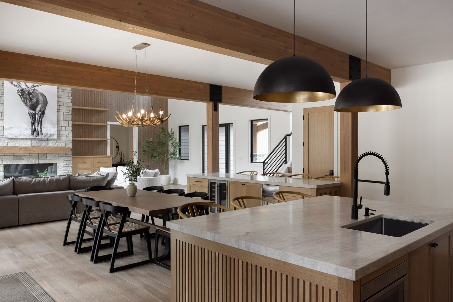 Light moves differently across honed stone, wood softens concrete, texture replaces color. Natural materials chosen to patina beautifully over time.