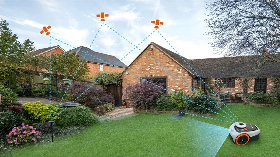 A robotic lawn mower in a backyard with multiple GPS satellites indicating its navigation system