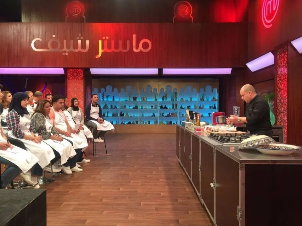 Chef Redouane teaching Morocco Master Chef, showcasing gig work in Canada.