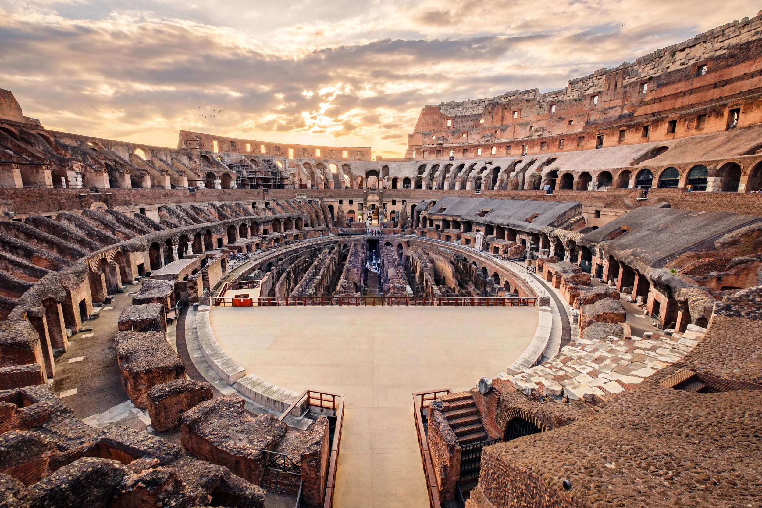 scenic-view-of-roman-colosseum-interior-at-sunset-2024-09-19-13-19-44-utc.jpg
